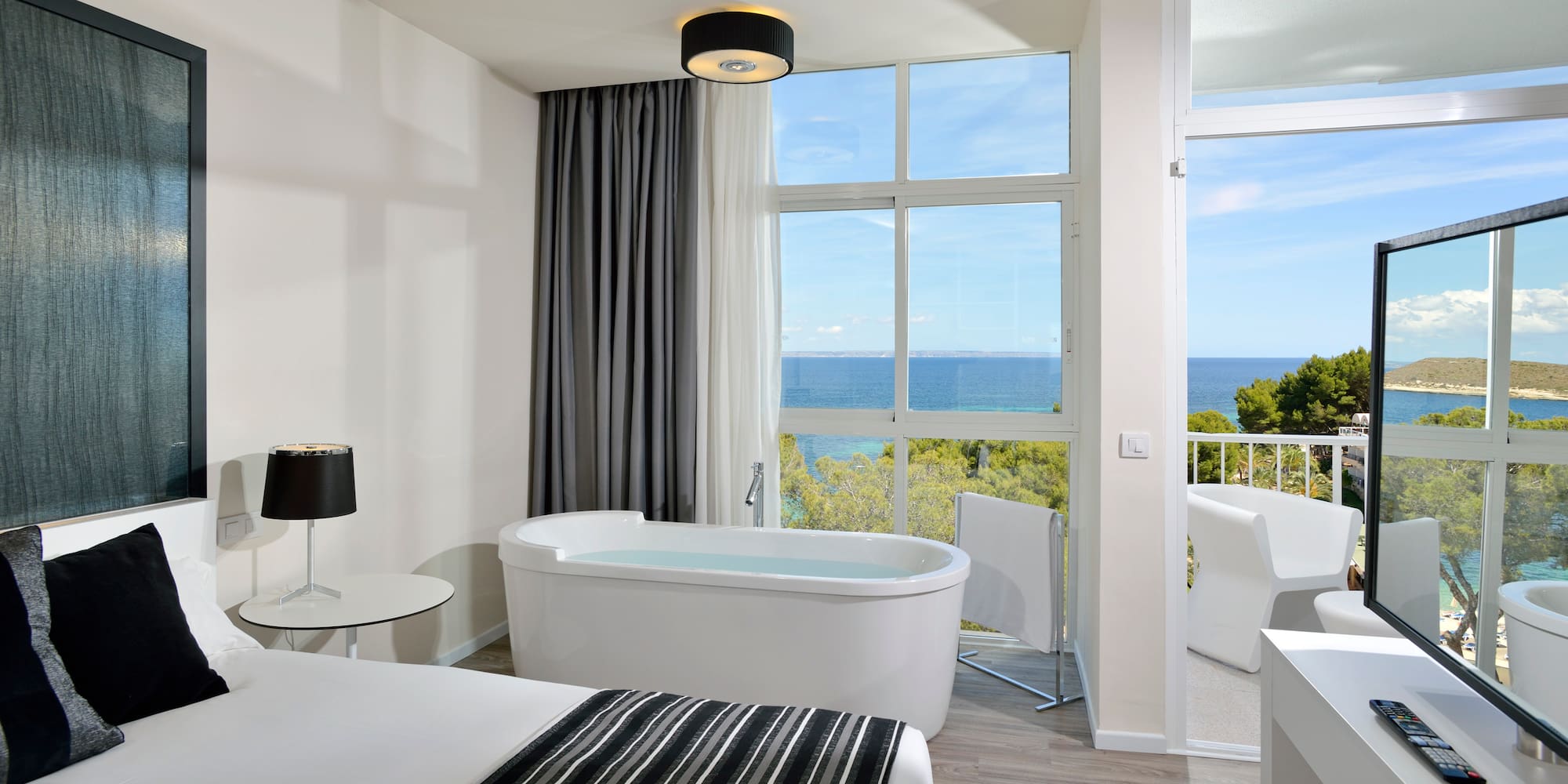 a room with a tub and a window