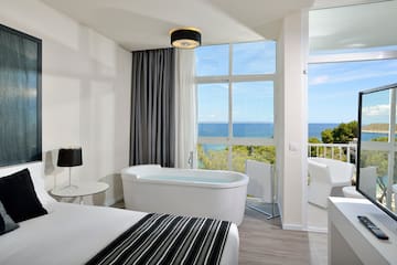 a room with a tub and a window