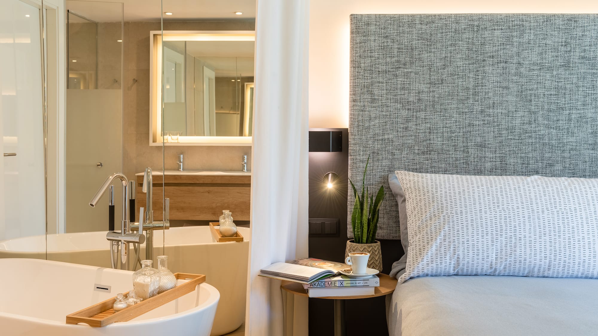 a bedroom with a bed and a bathtub