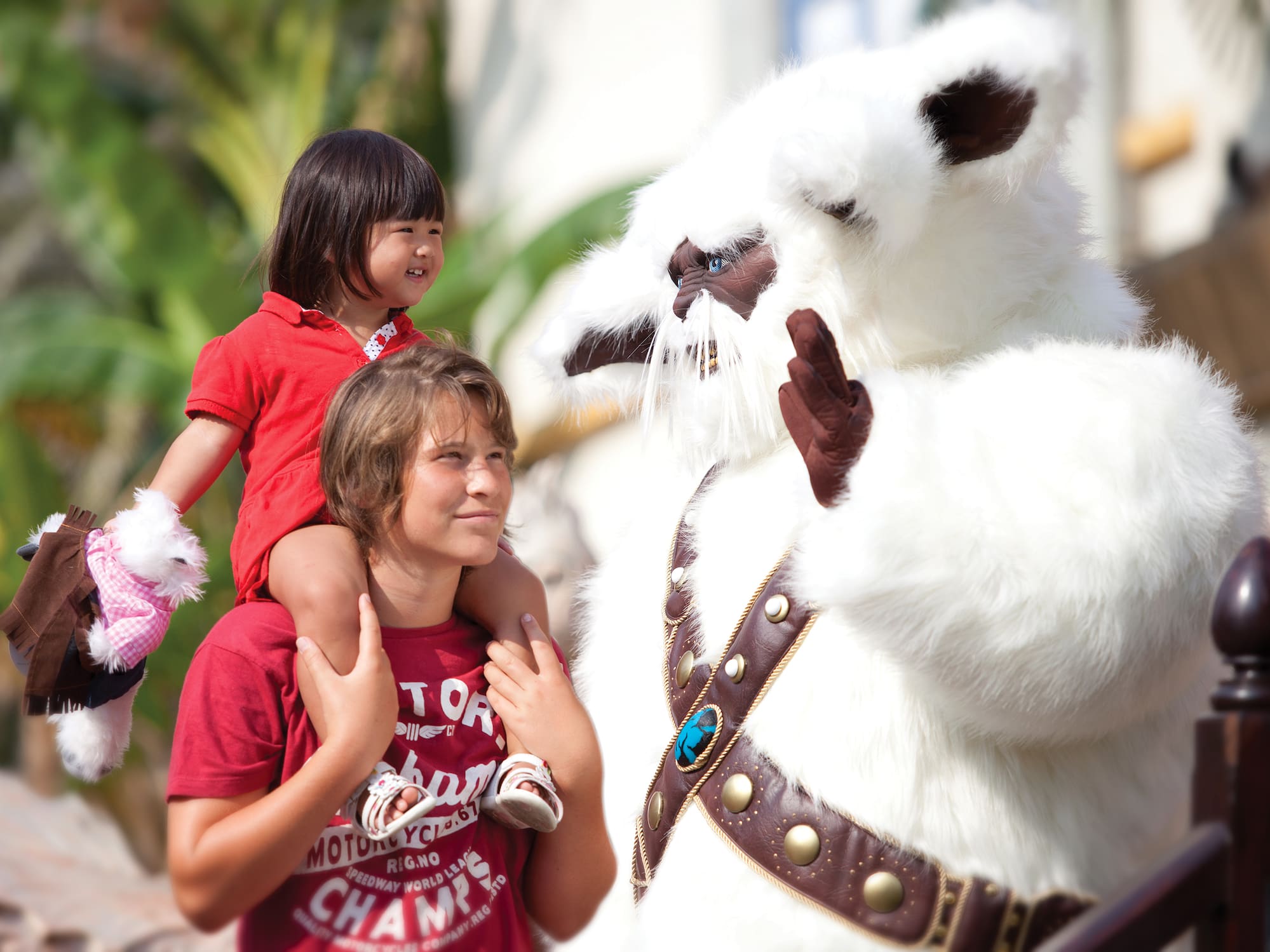 a girl on a person's shoulders