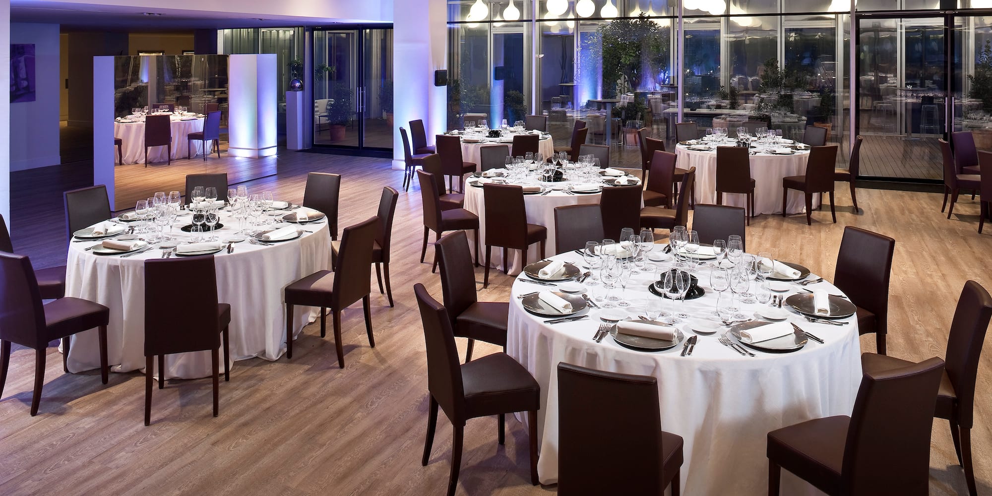 a large room with tables and chairs