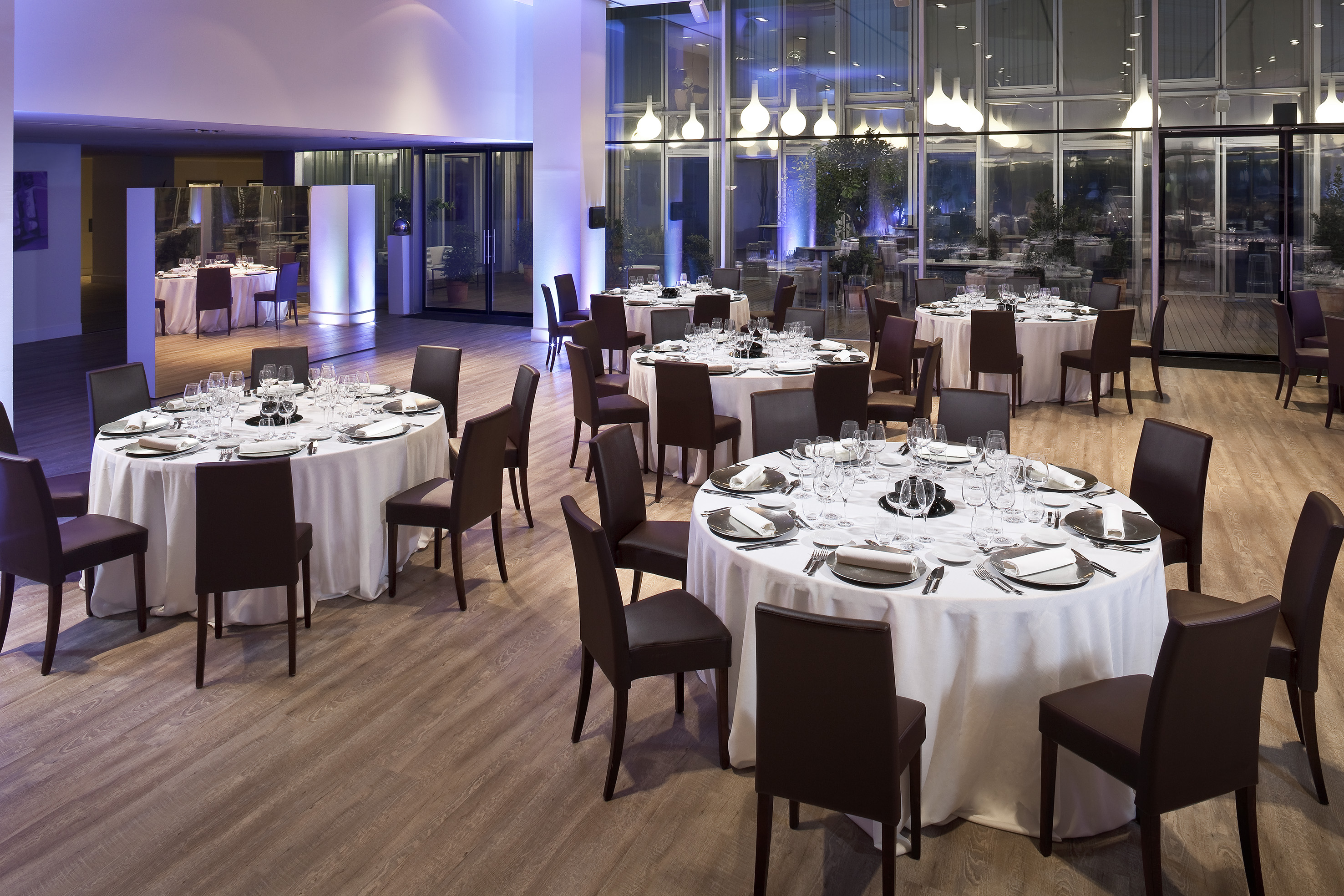 a large room with tables and chairs