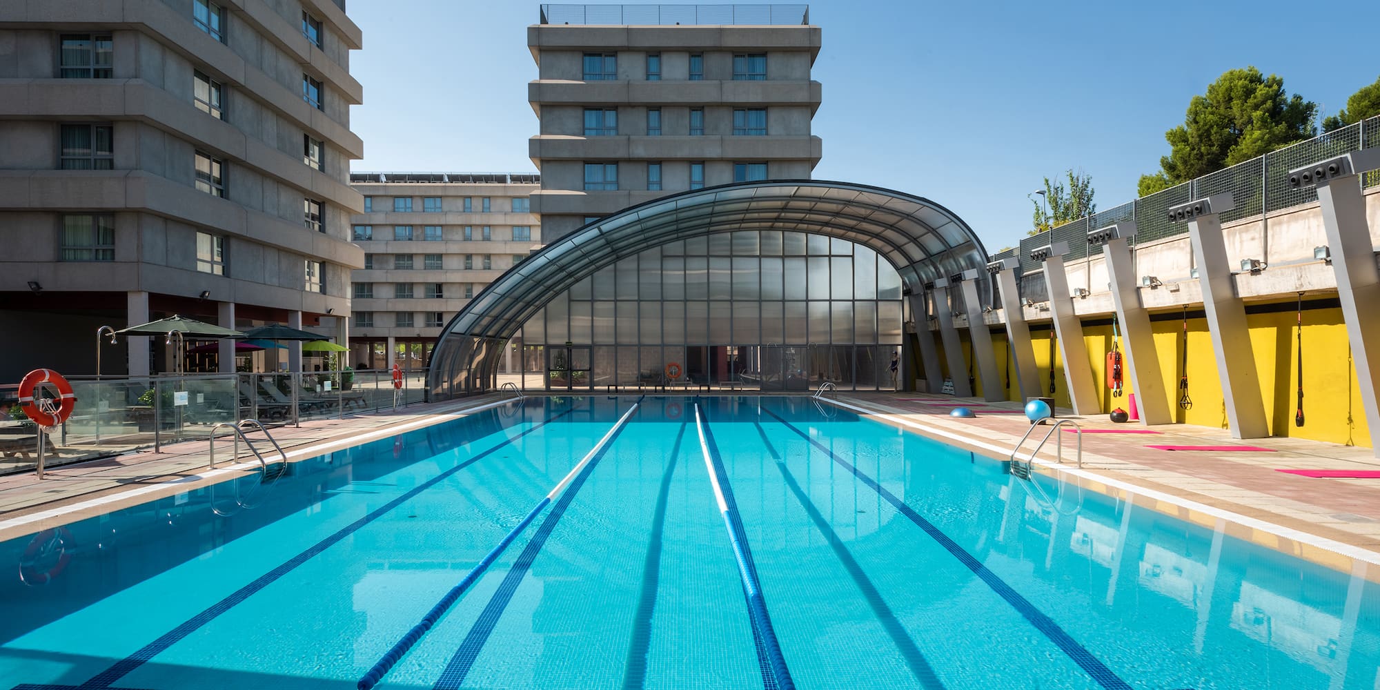 a swimming pool with a covered roof