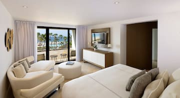a room with a television and a bed