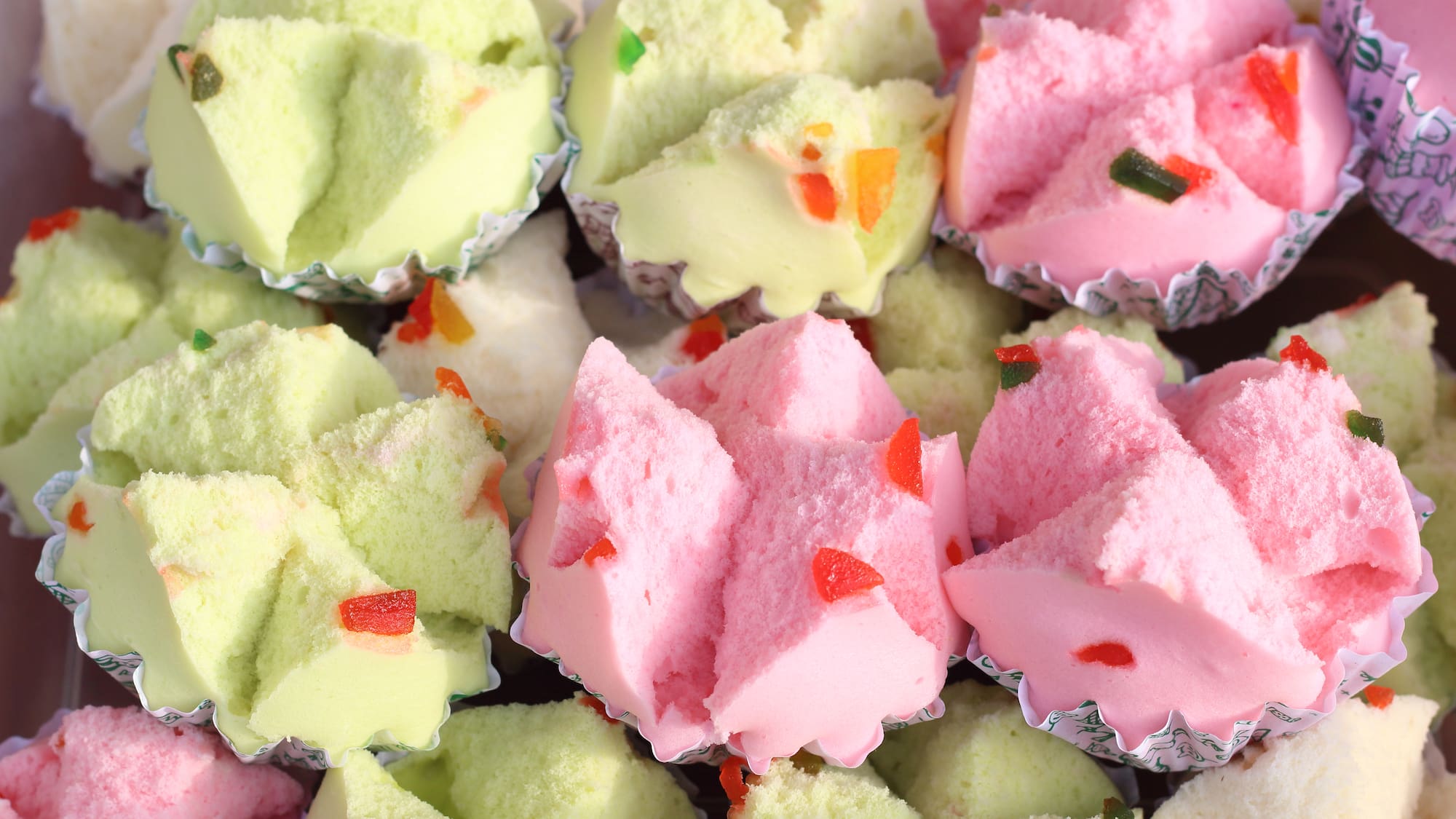 a group of colorful cupcakes