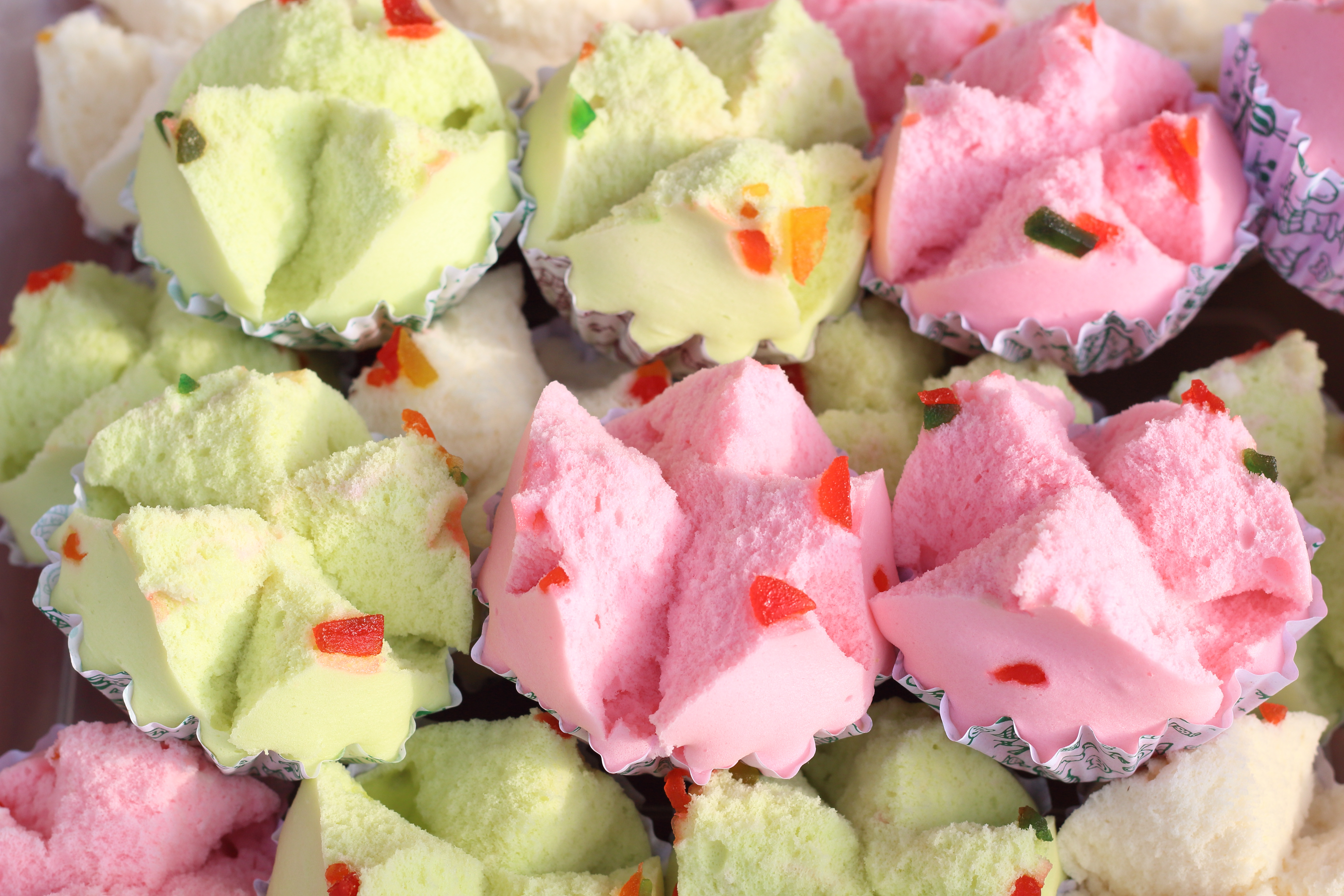 a group of colorful cupcakes