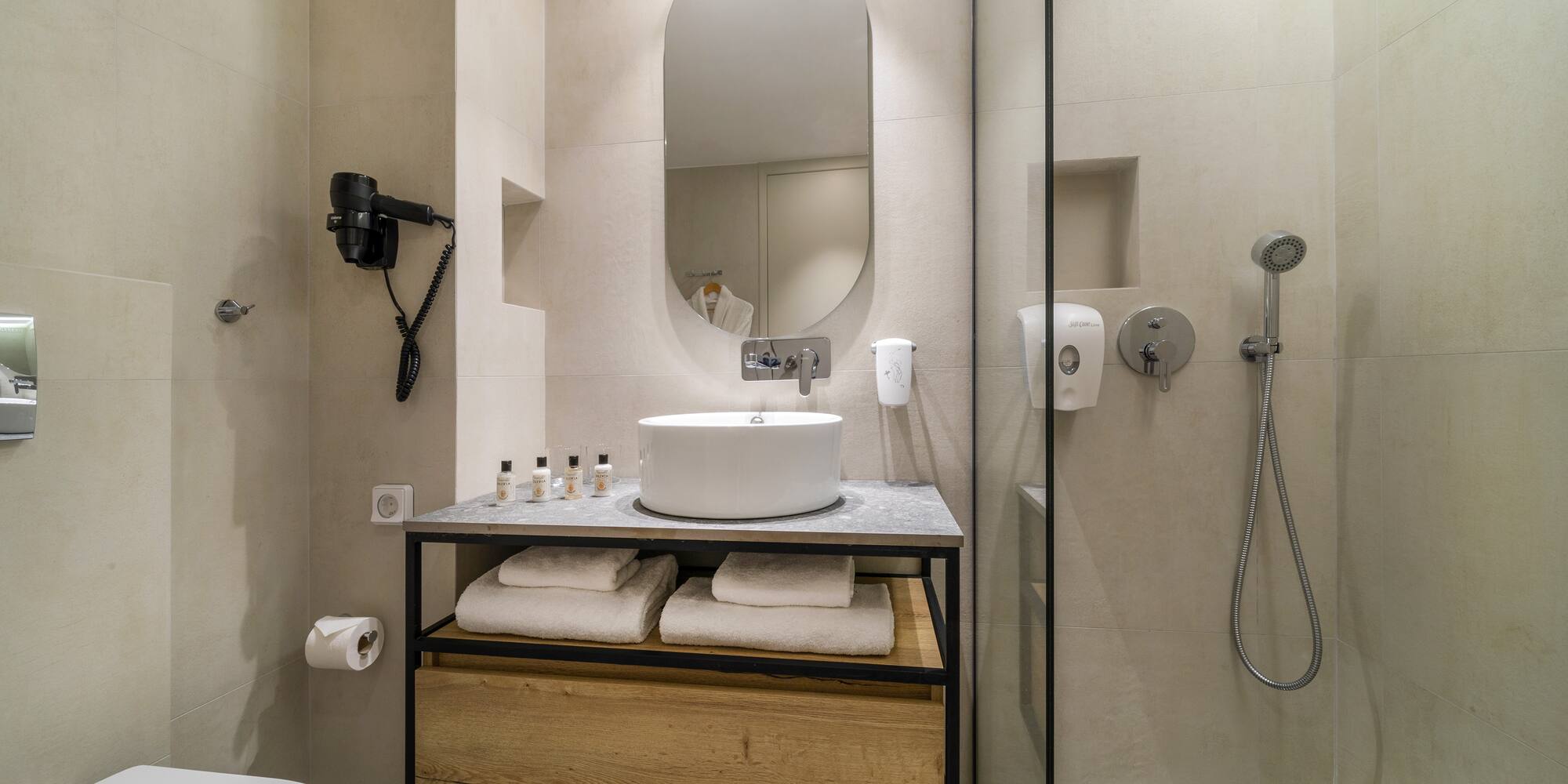 a bathroom with a sink and shower