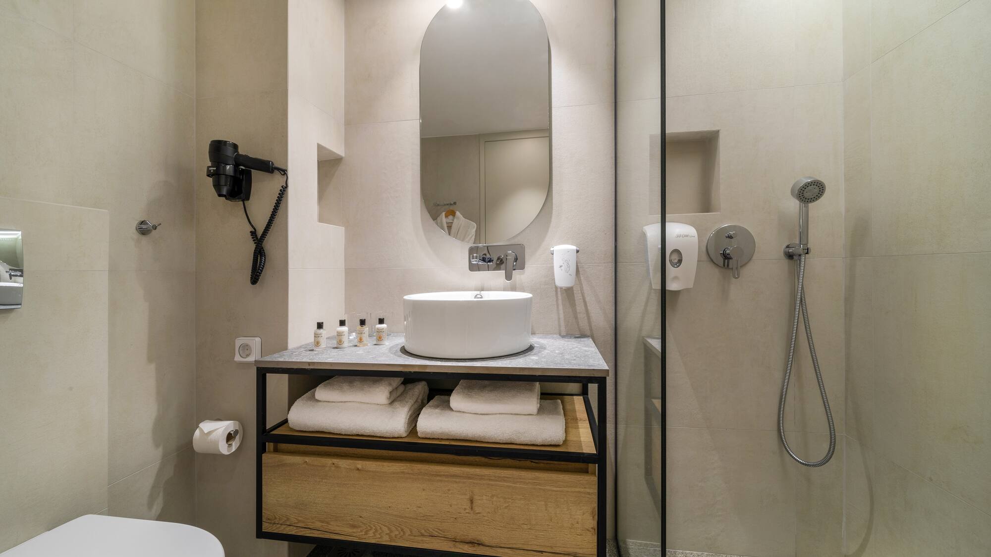 a bathroom with a sink and shower