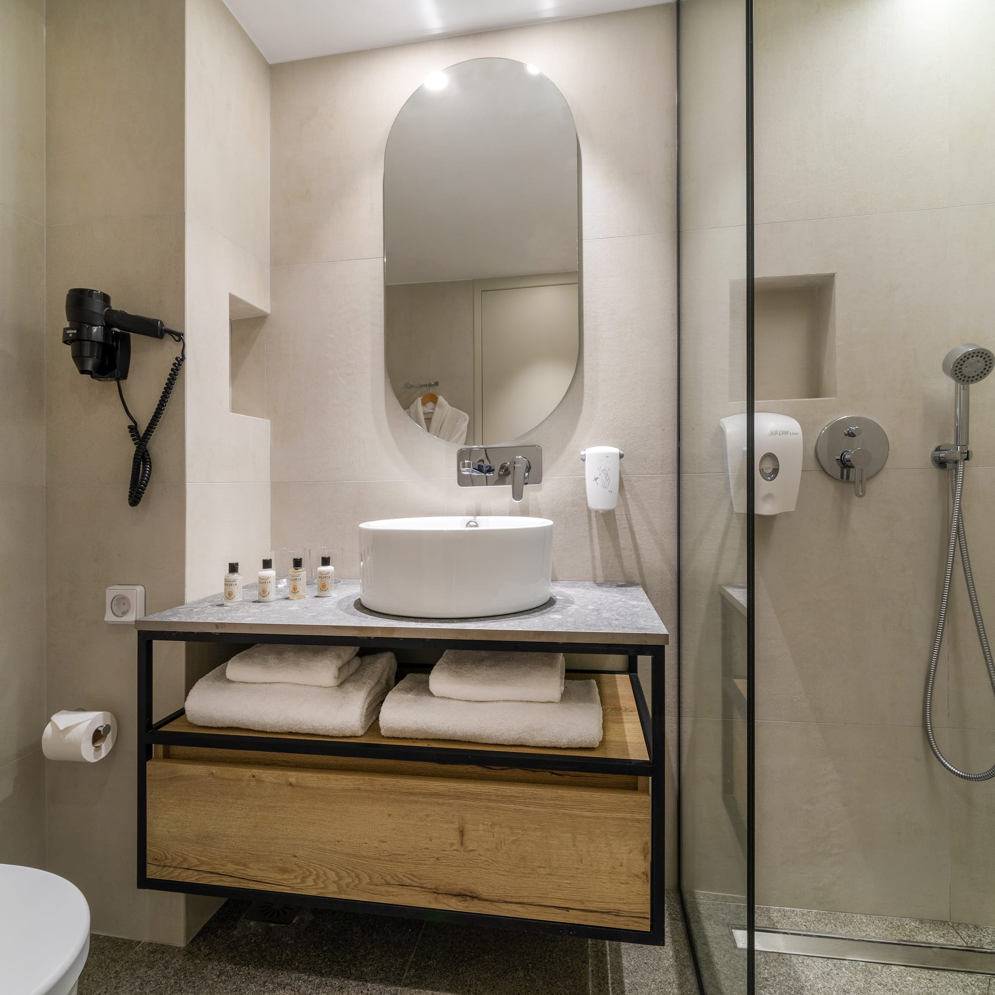 a bathroom with a sink and shower