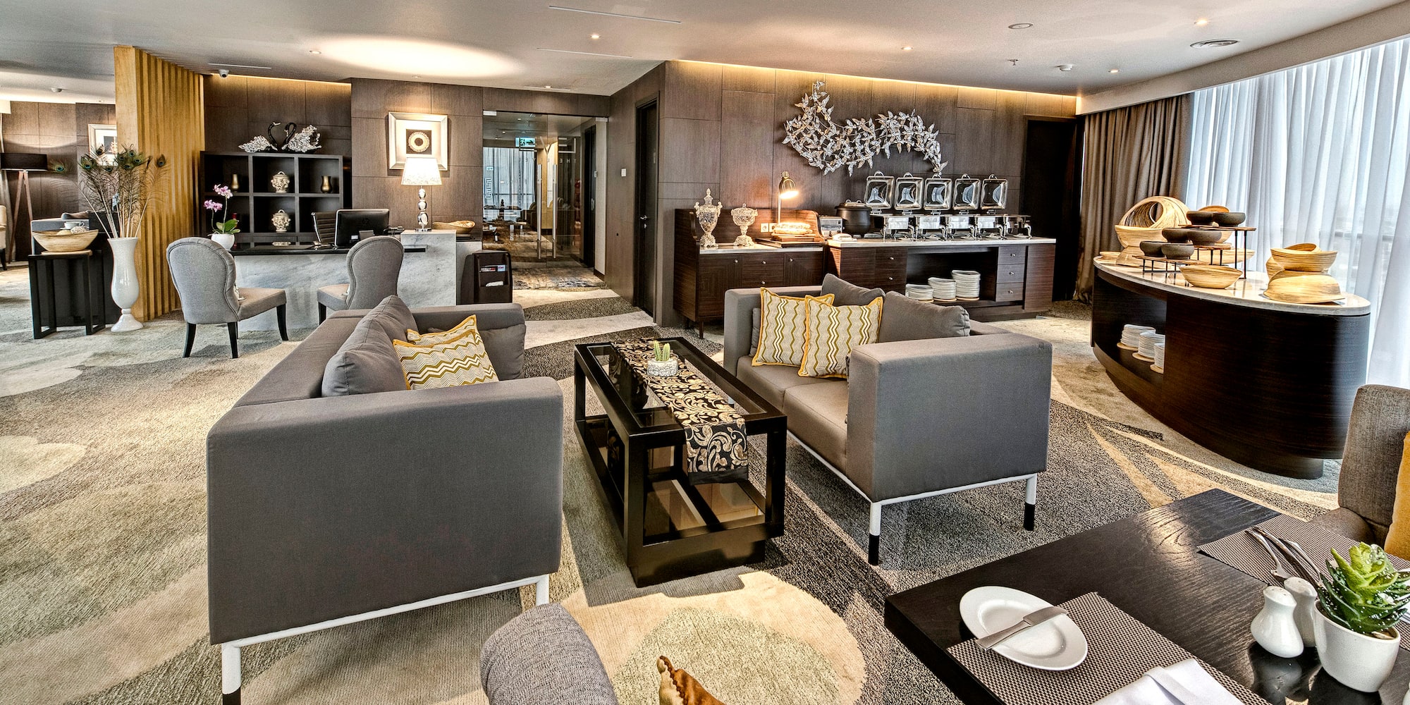 a room with couches and tables