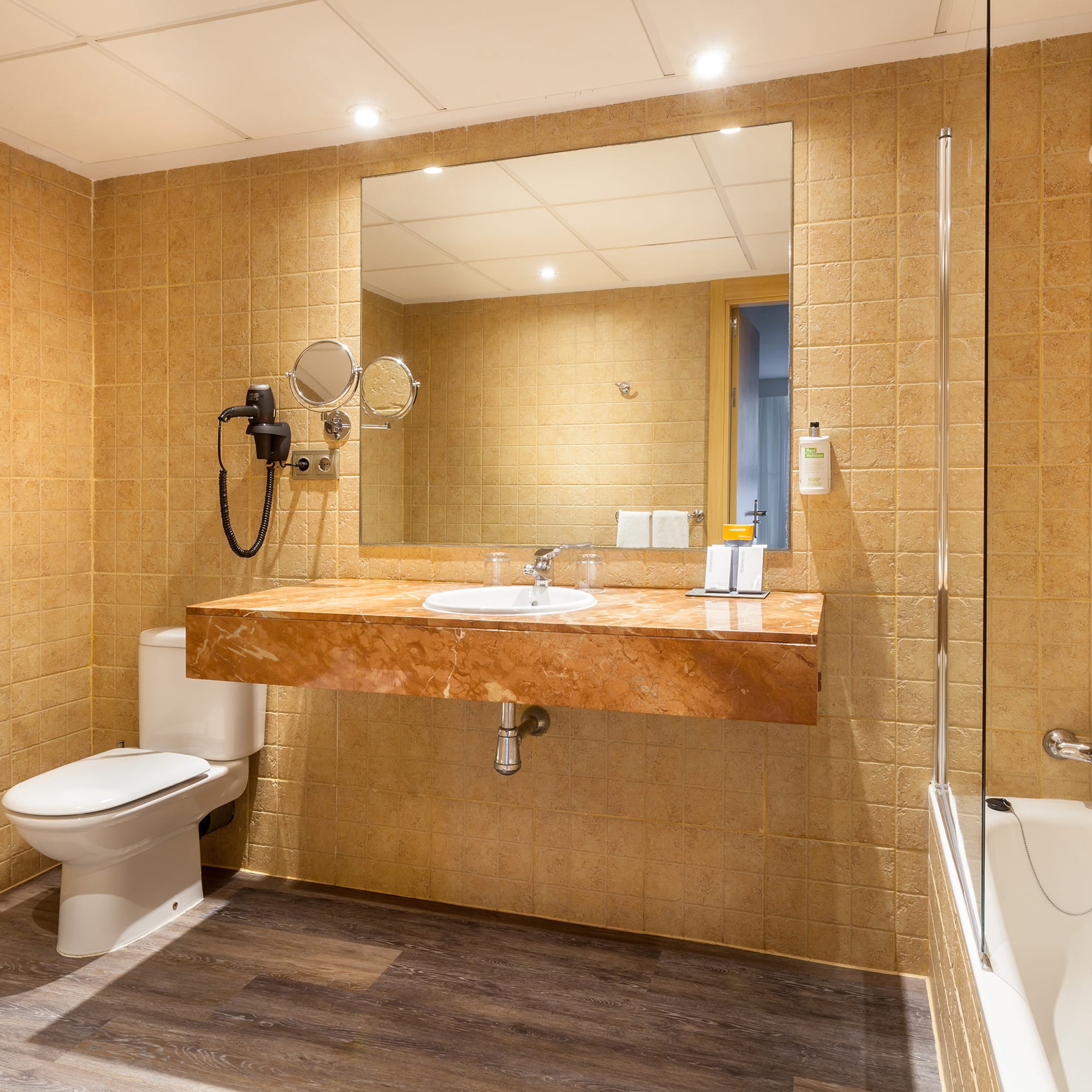 a bathroom with a sink and a shower