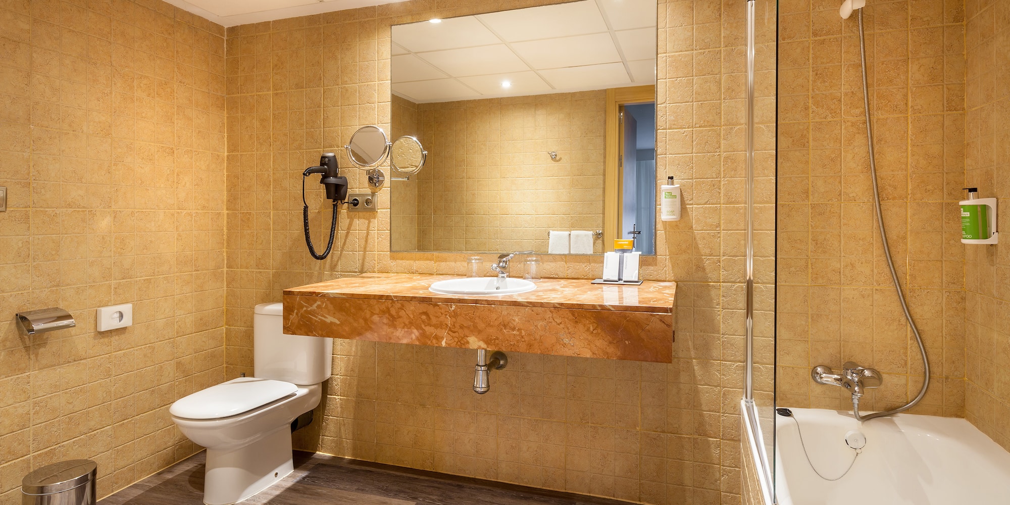 a bathroom with a sink and a shower
