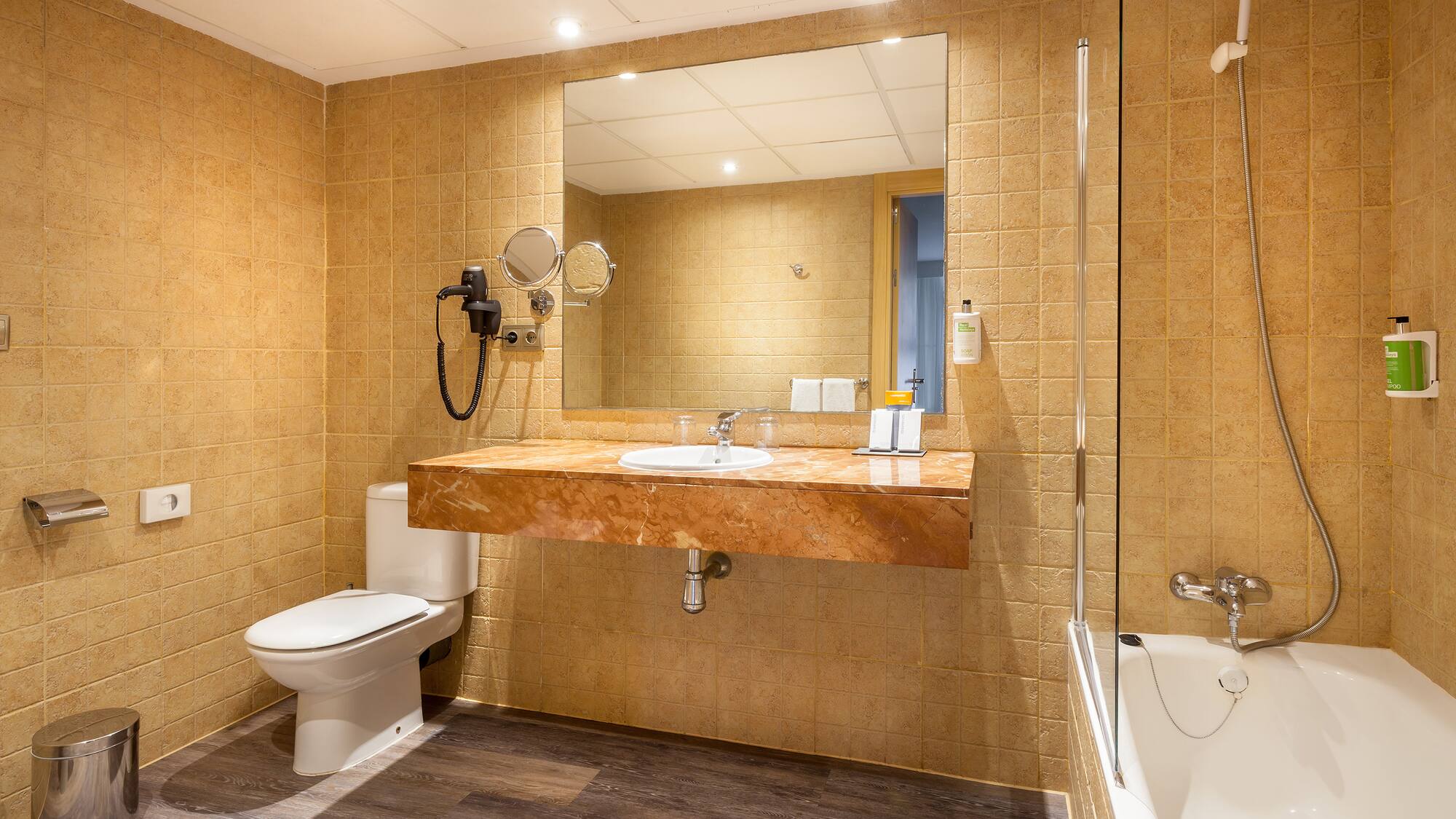 a bathroom with a sink and a shower