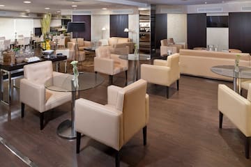 a room with chairs and tables