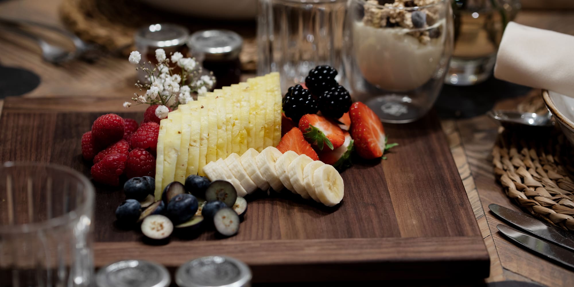 a plate of fruit and yogurt