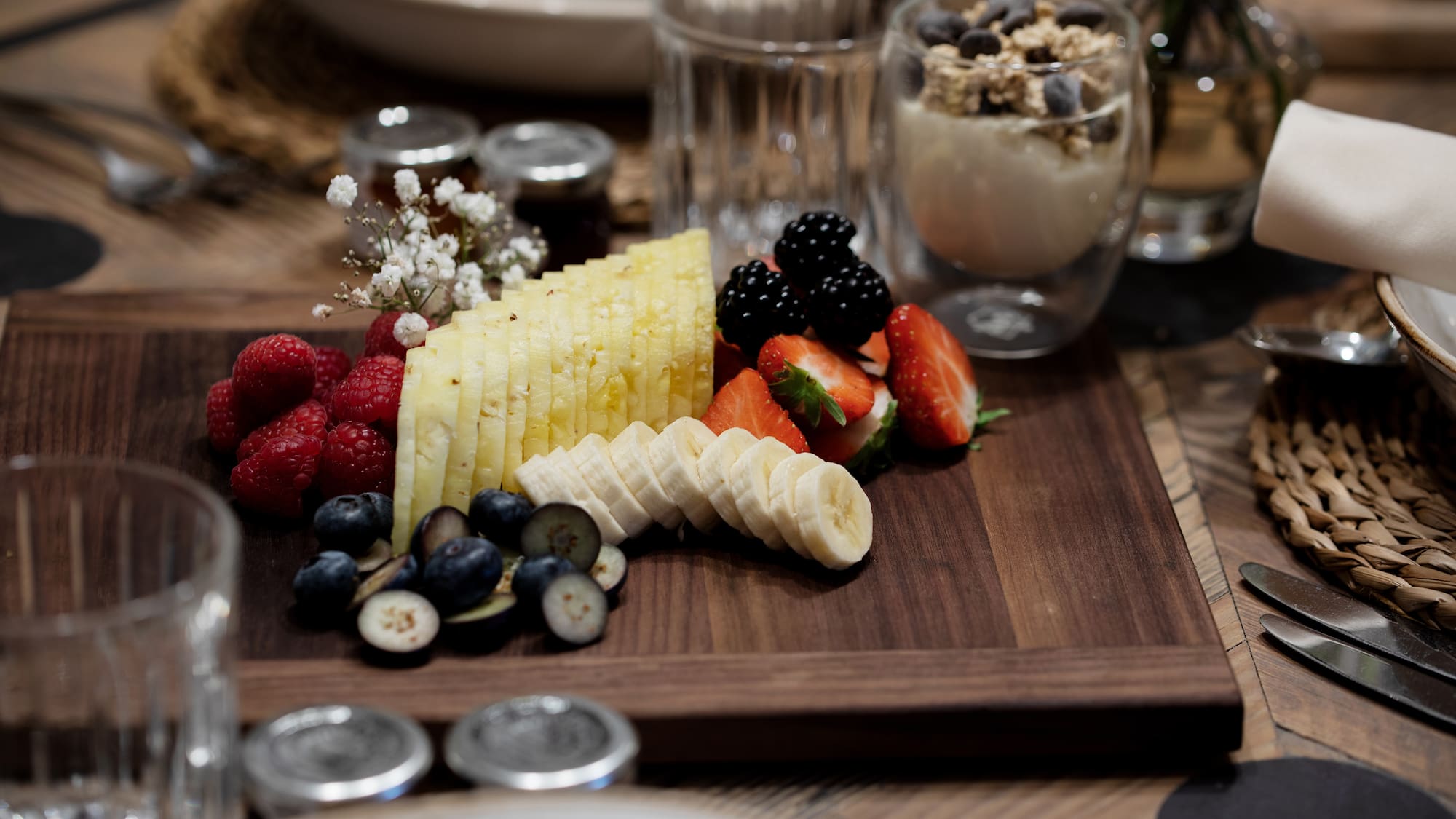 a plate of fruit and yogurt