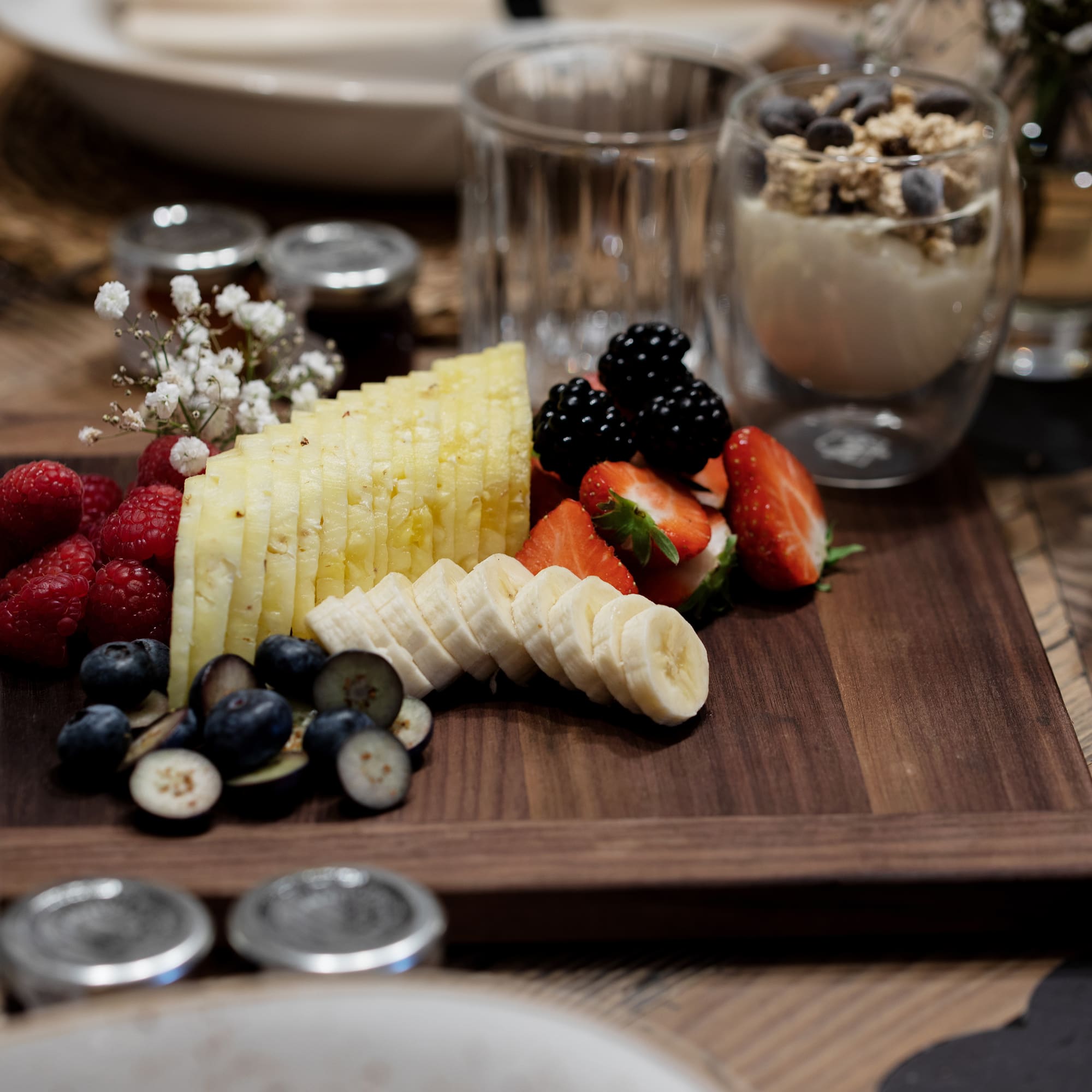 a plate of fruit and yogurt