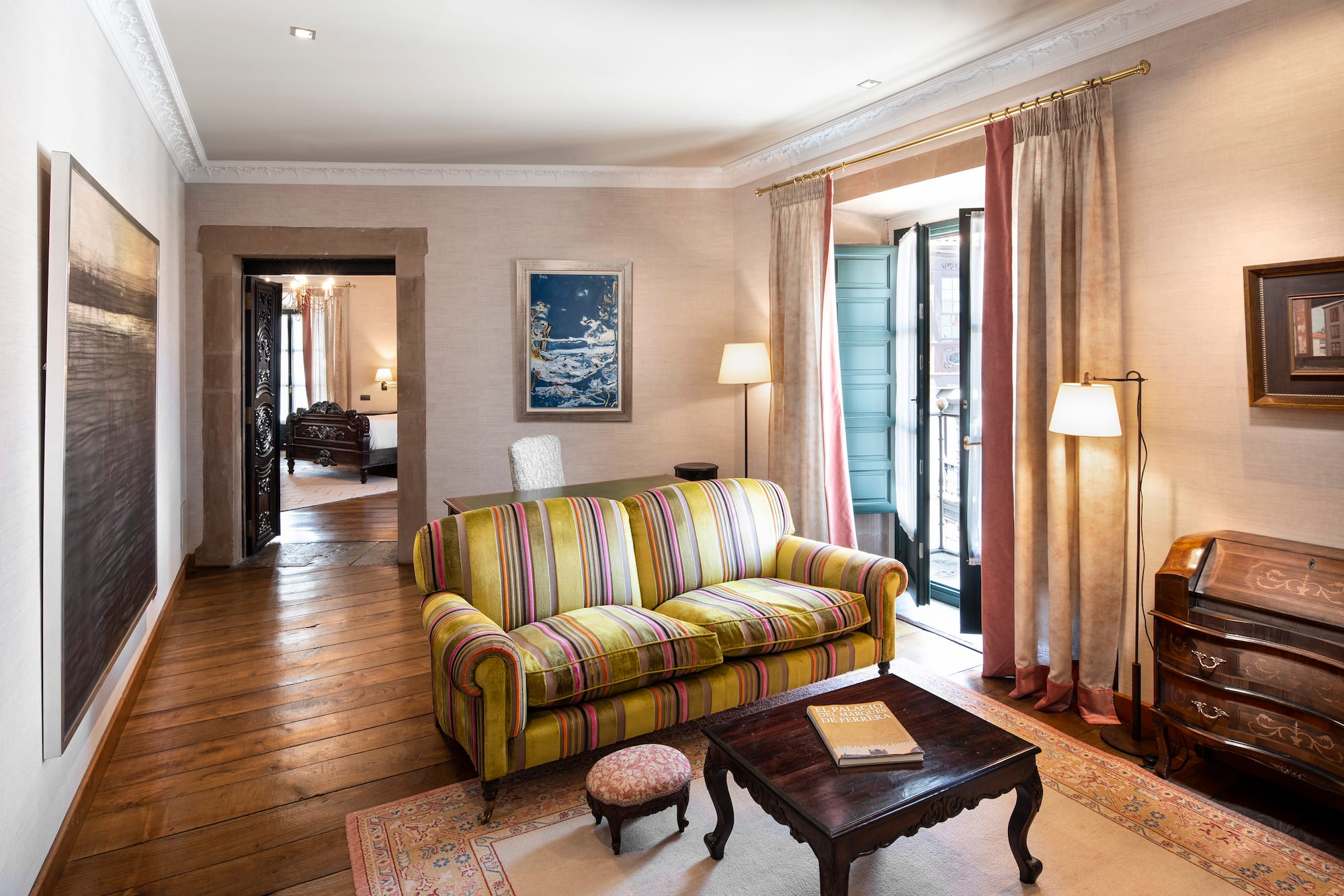 a living room with a couch and a table