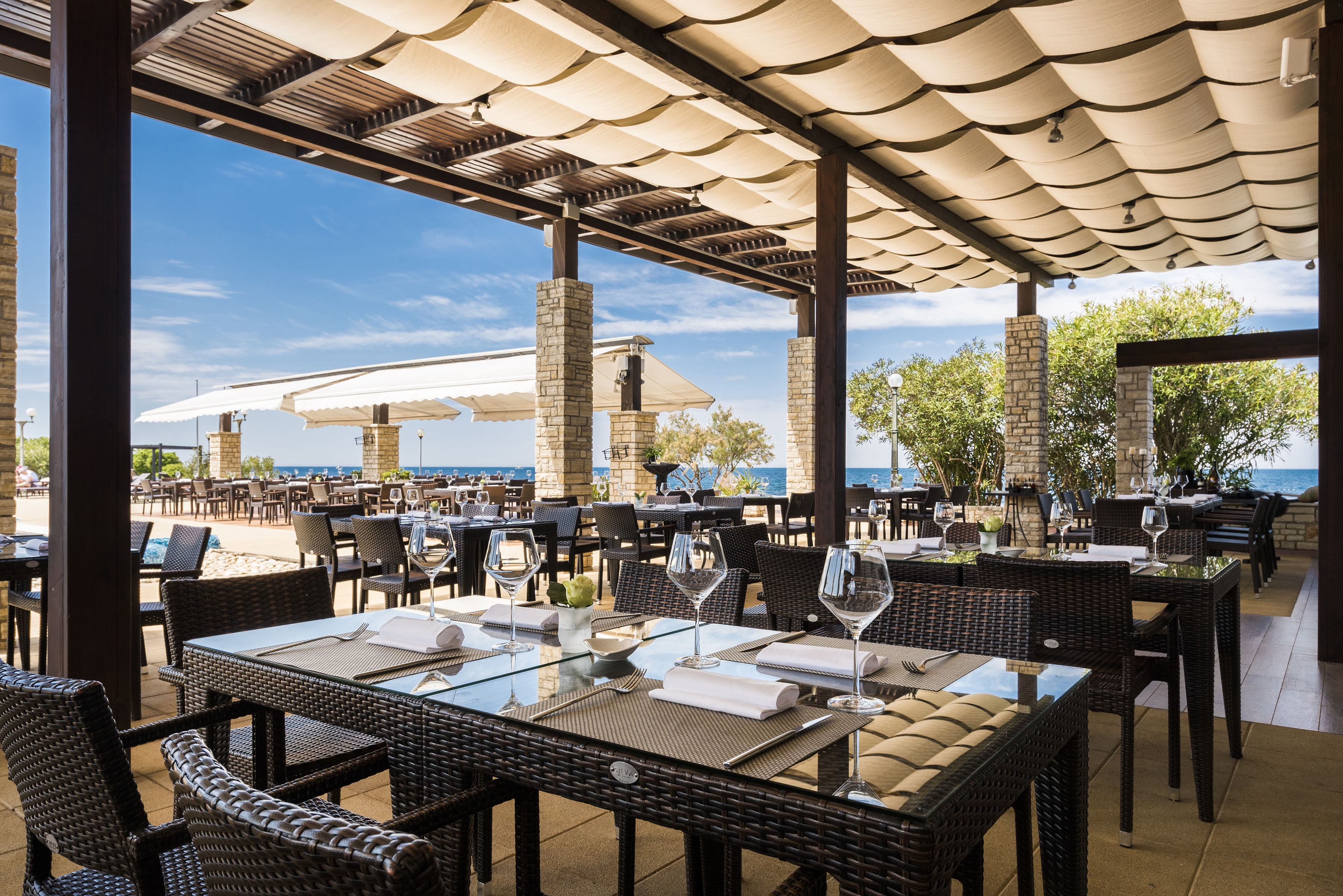 a restaurant with tables and chairs