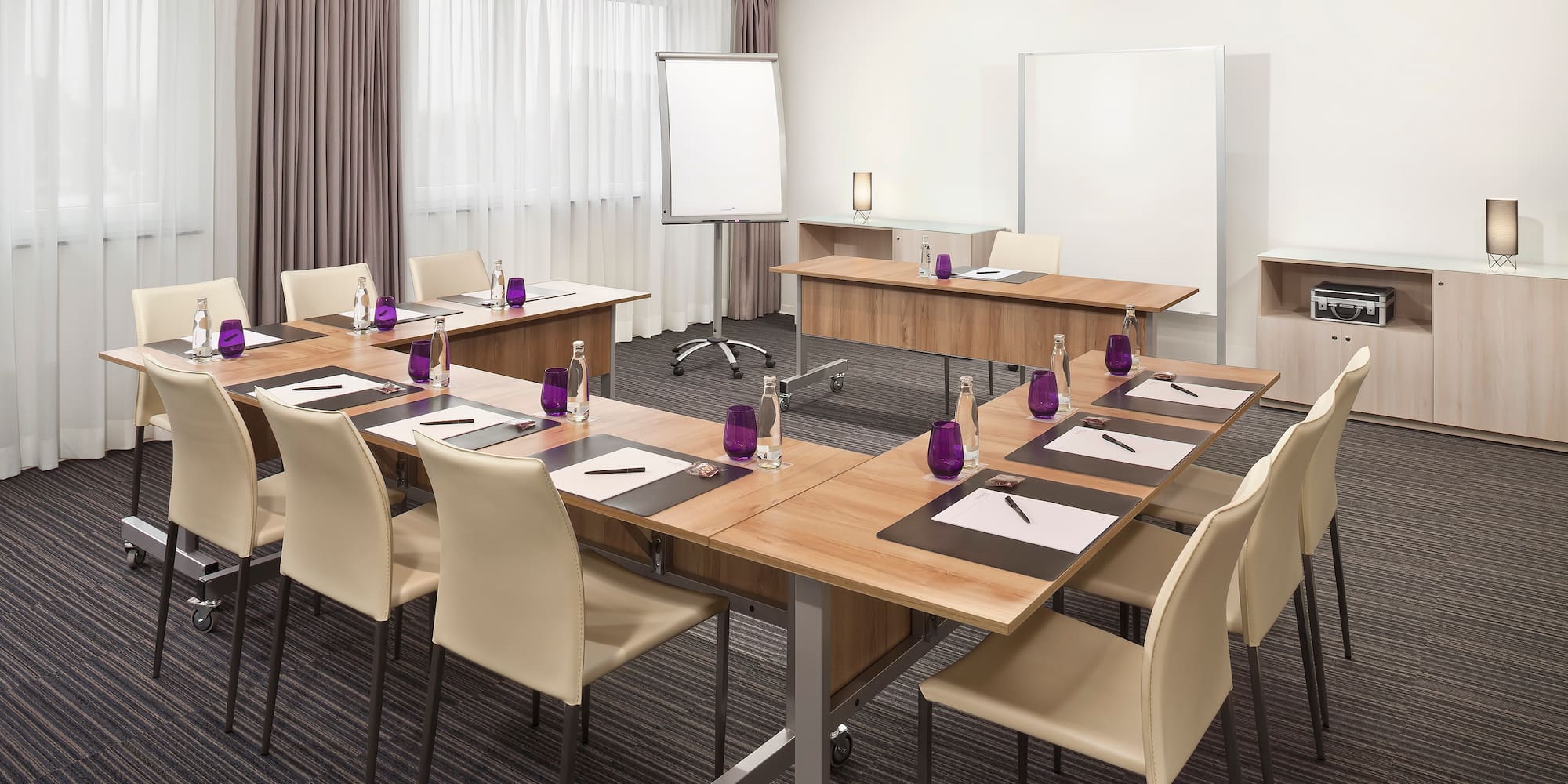 a room with tables and chairs