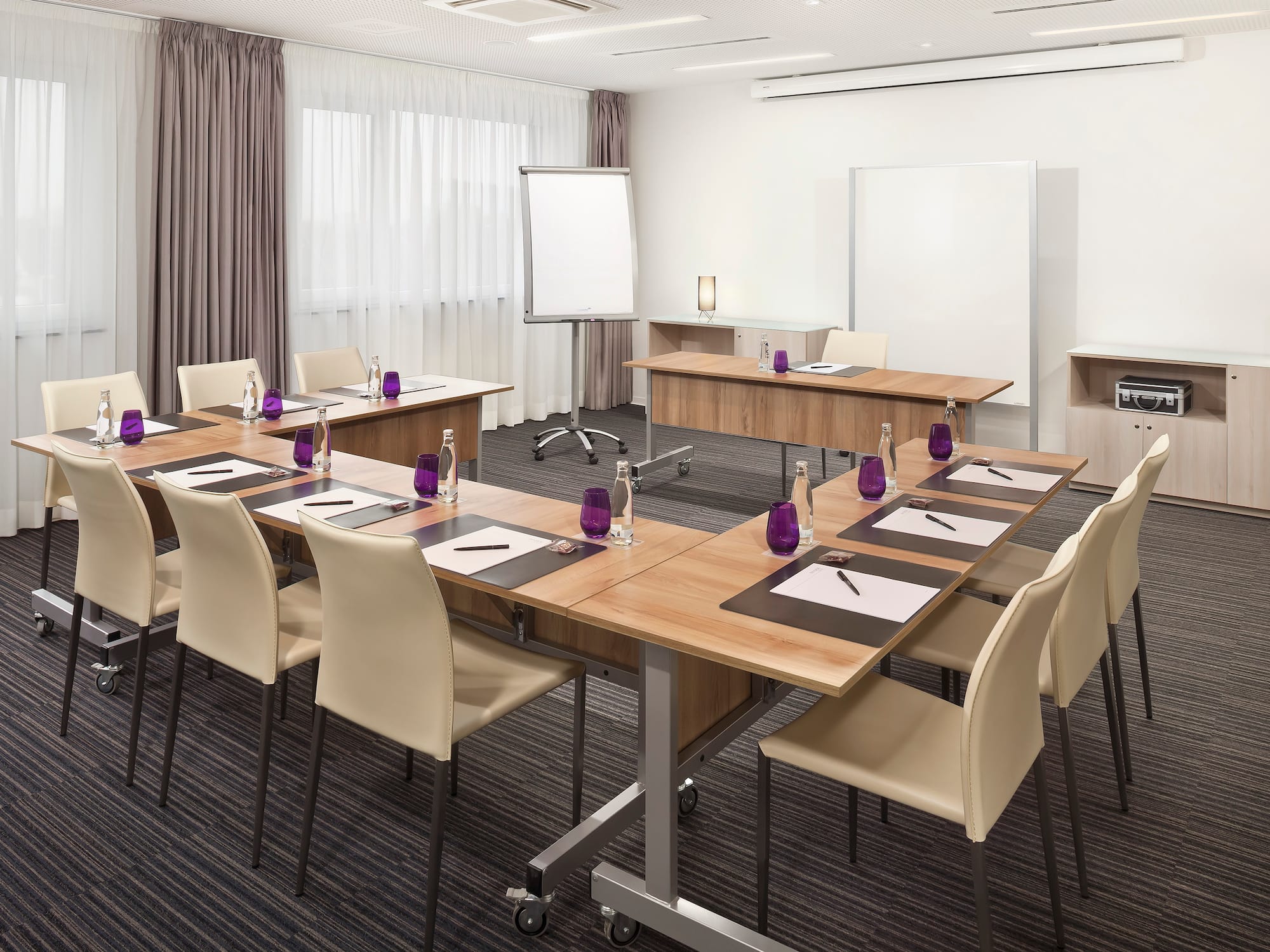 a room with tables and chairs