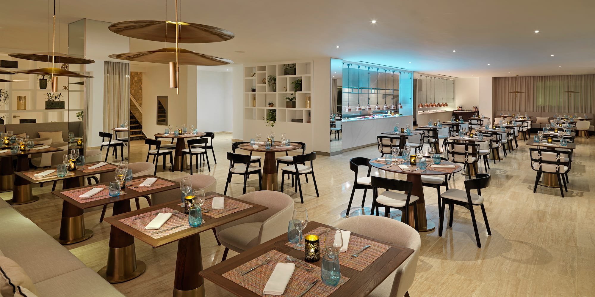 a restaurant with tables and chairs