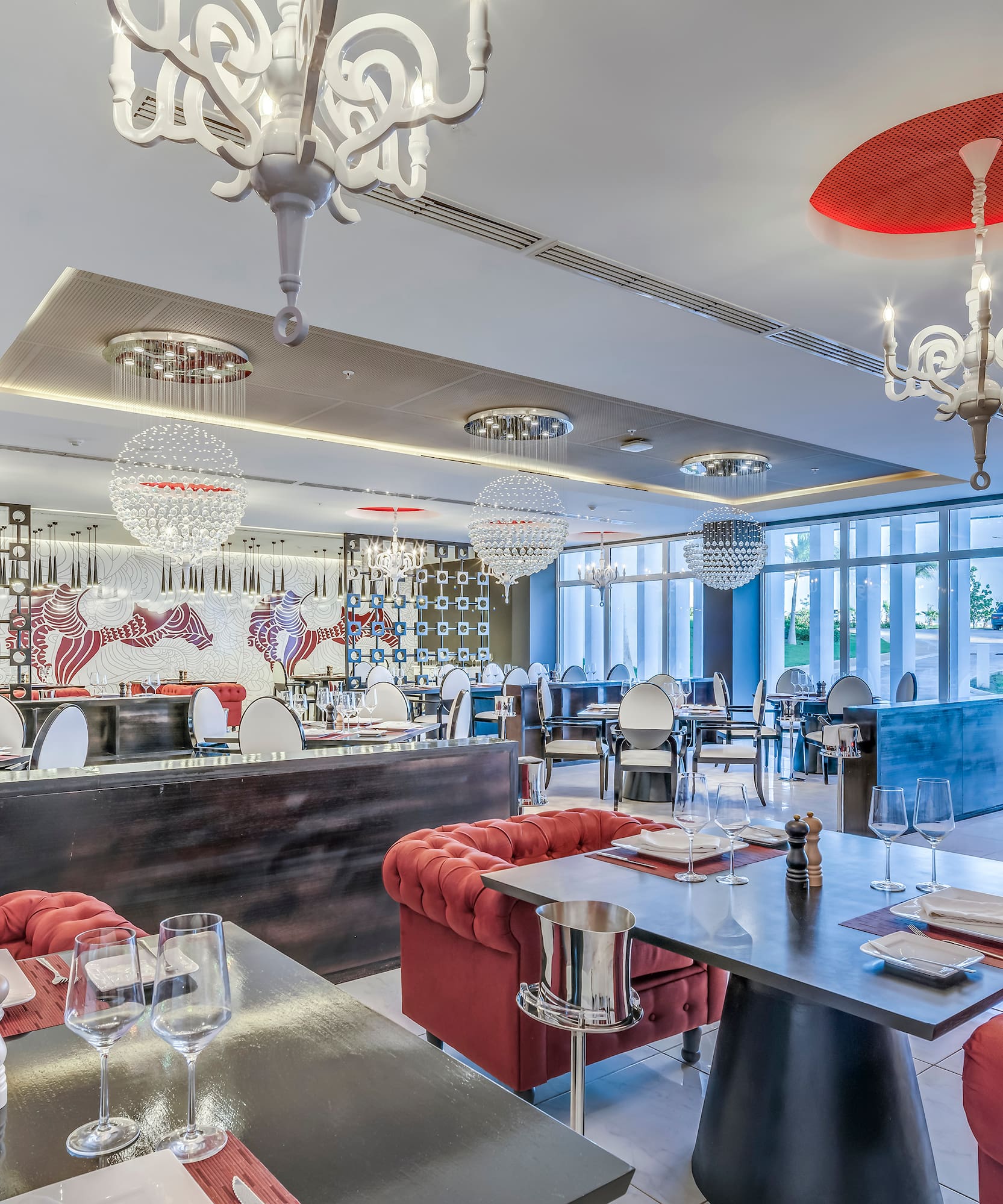 a restaurant with tables and chairs