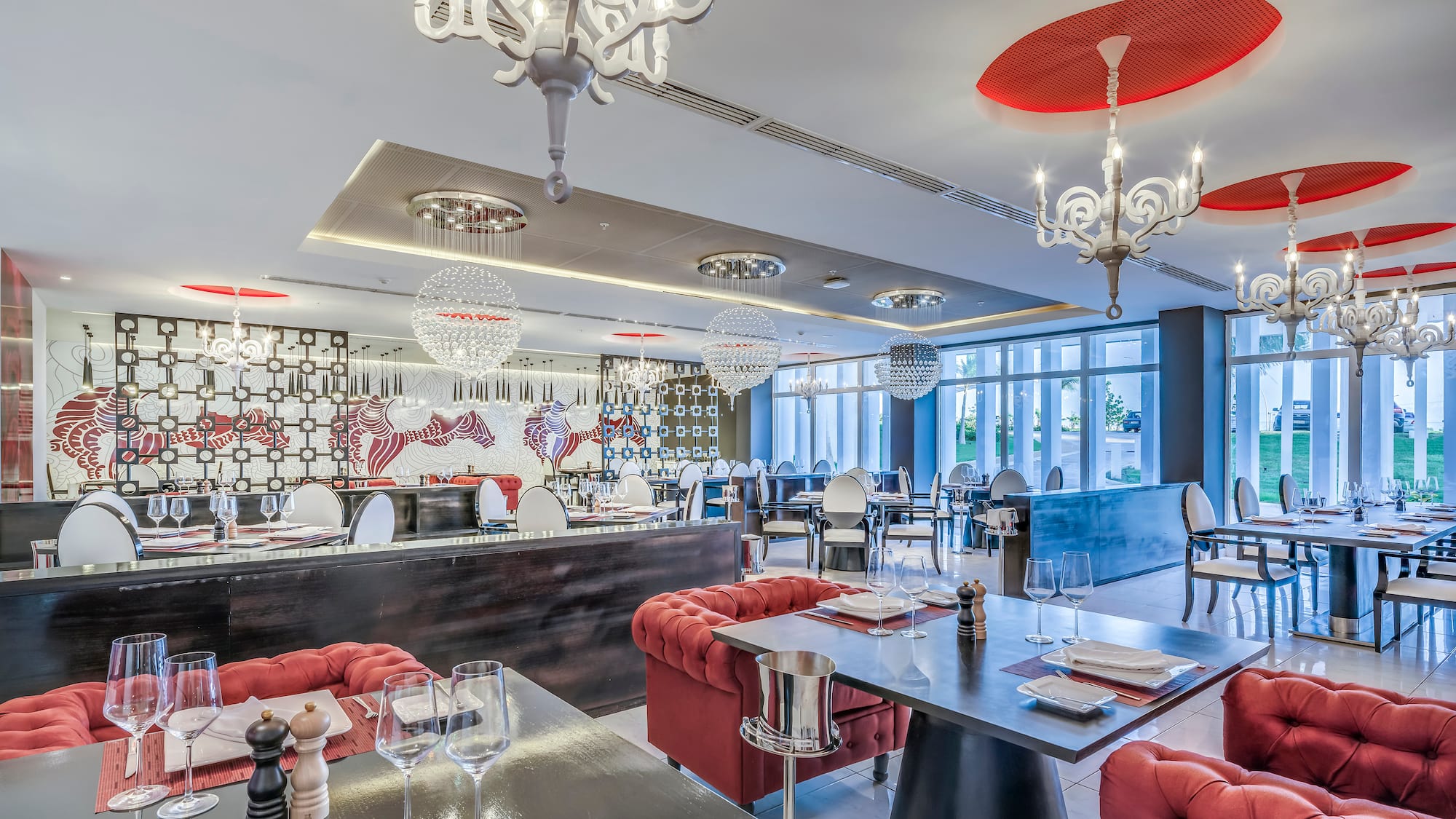 a restaurant with tables and chairs