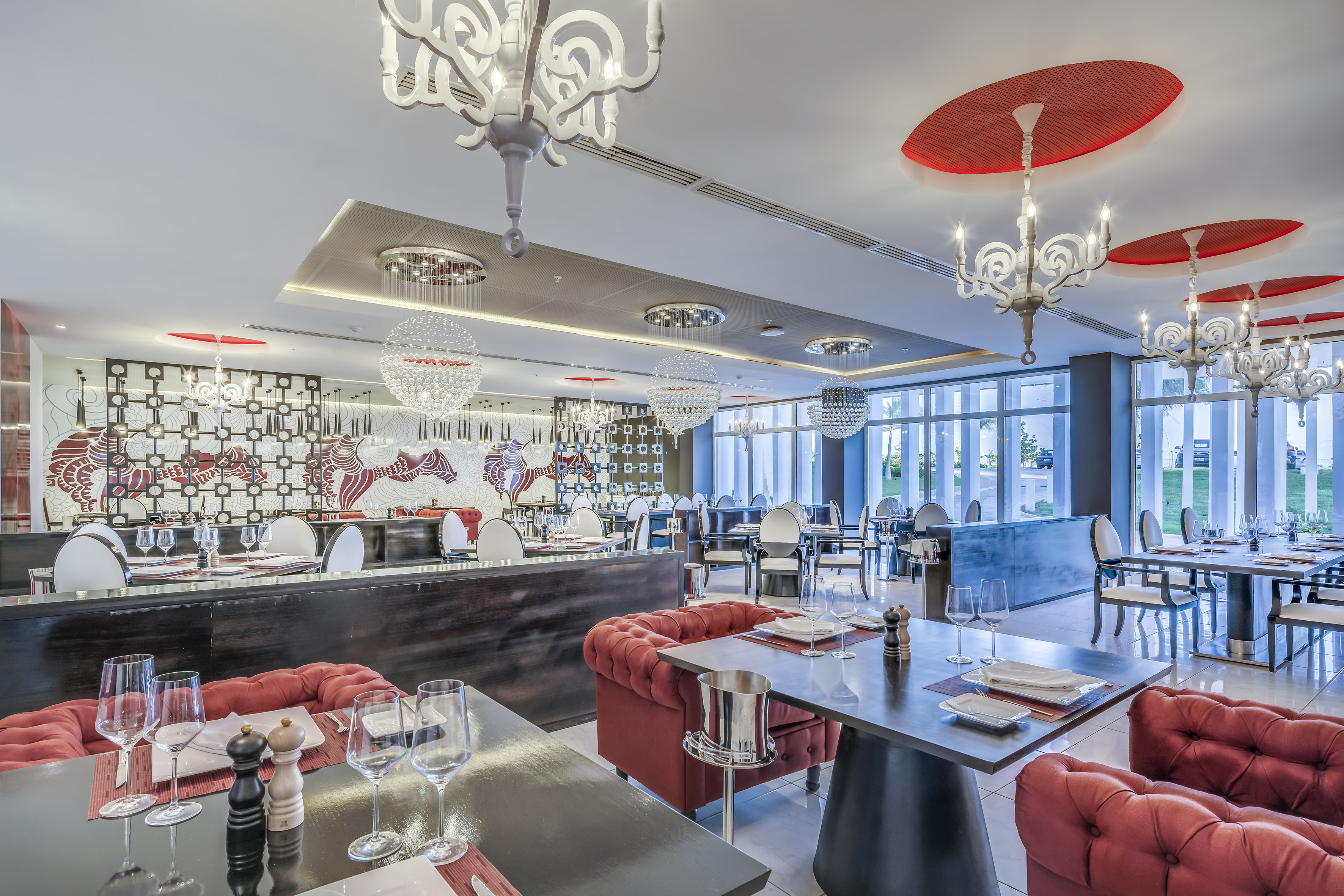 a restaurant with tables and chairs