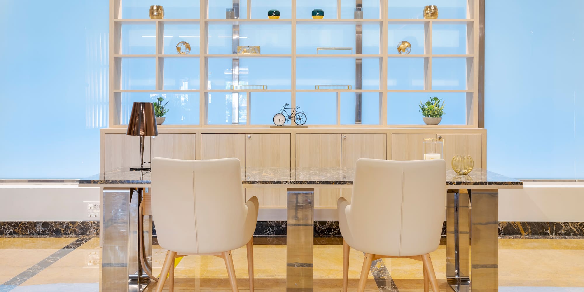 a room with a table and chairs