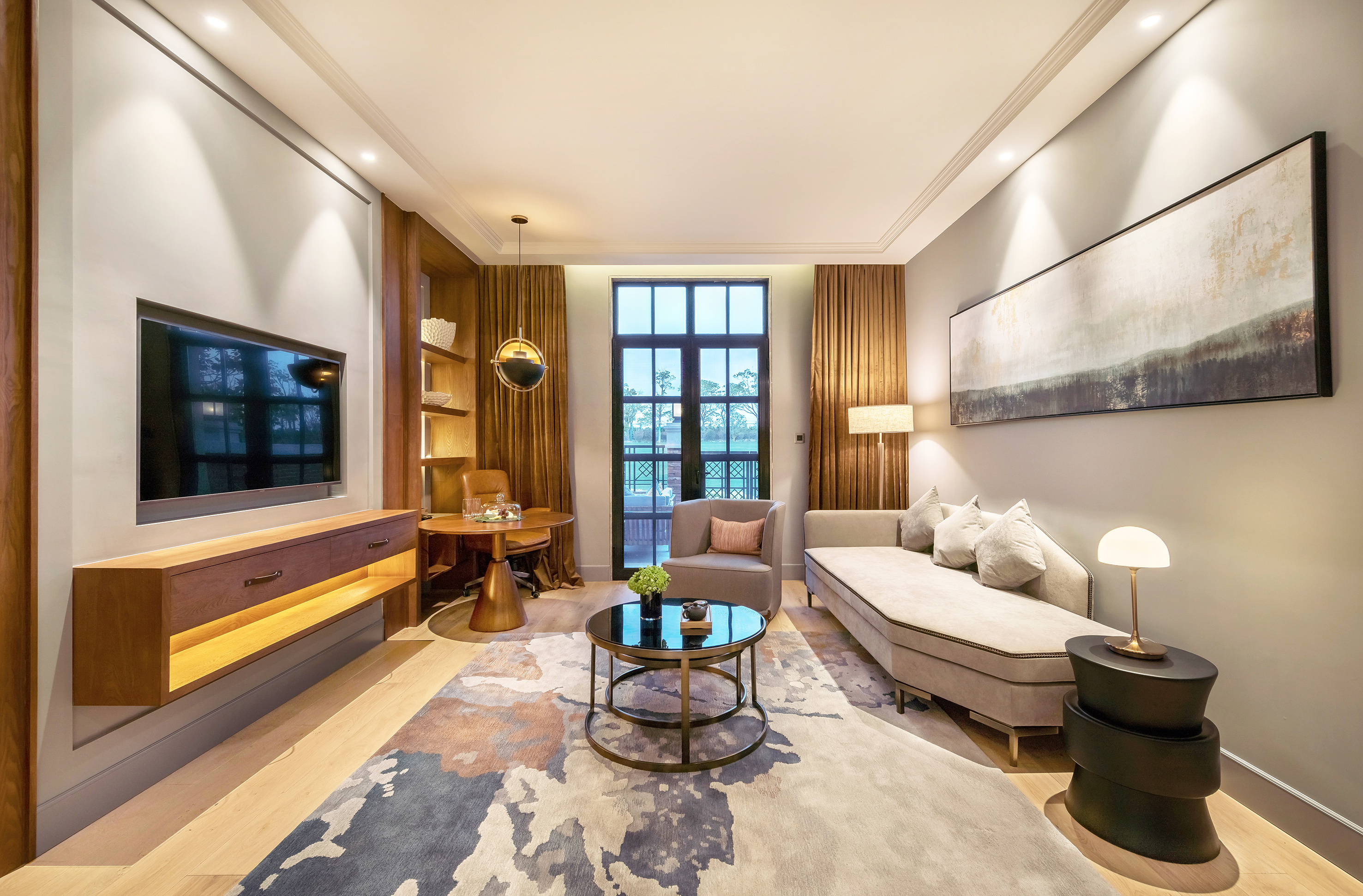 a living room with a couch and a tv