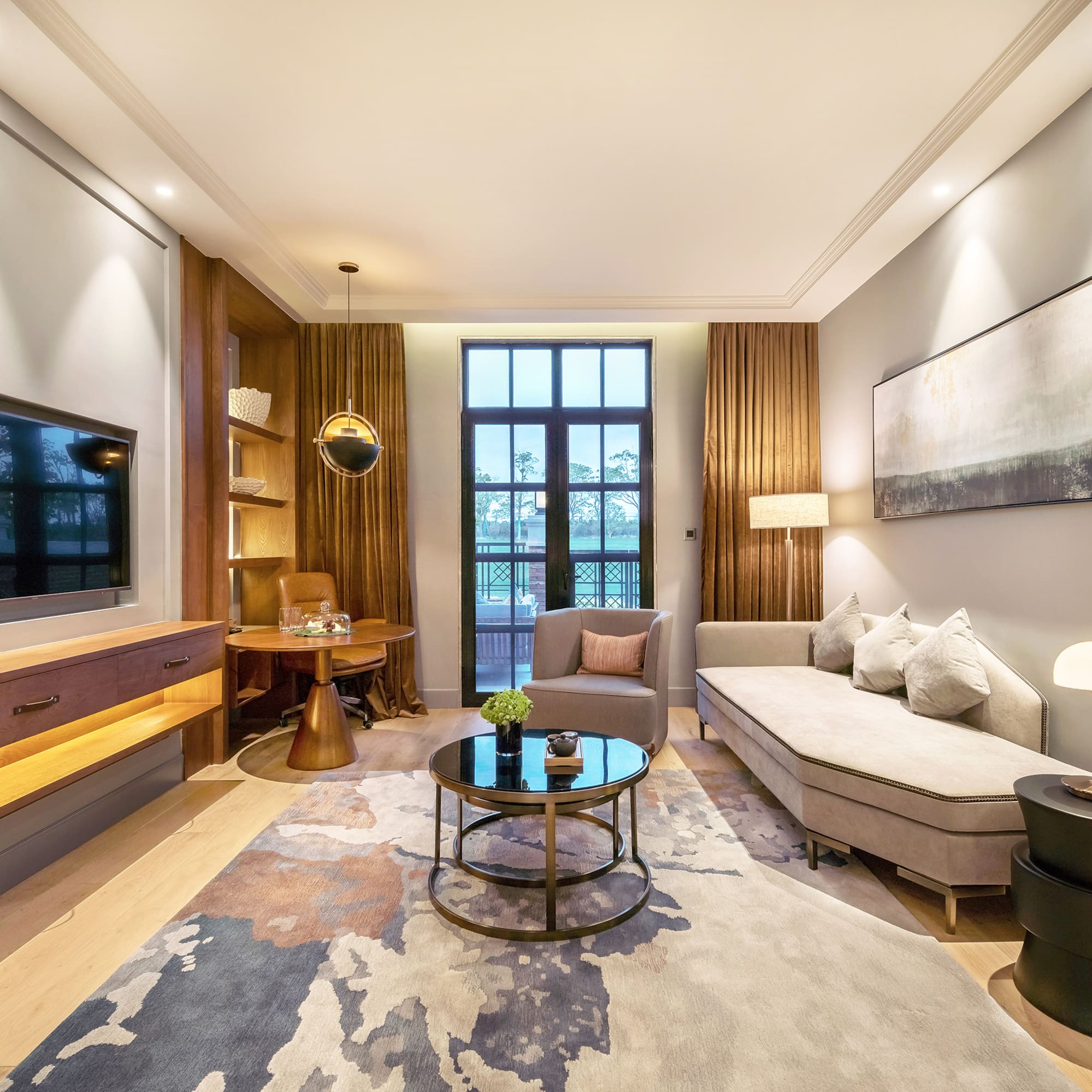 a living room with a couch and a tv