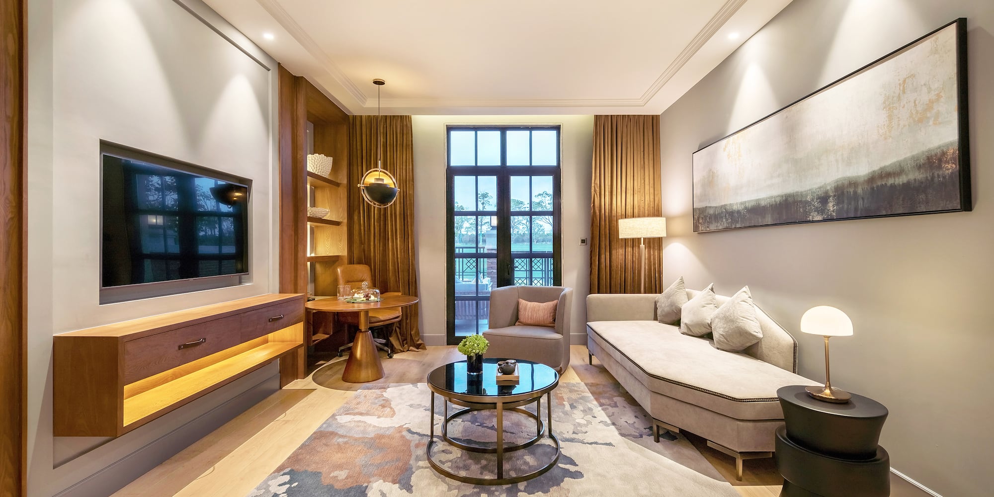 a living room with a couch and a tv