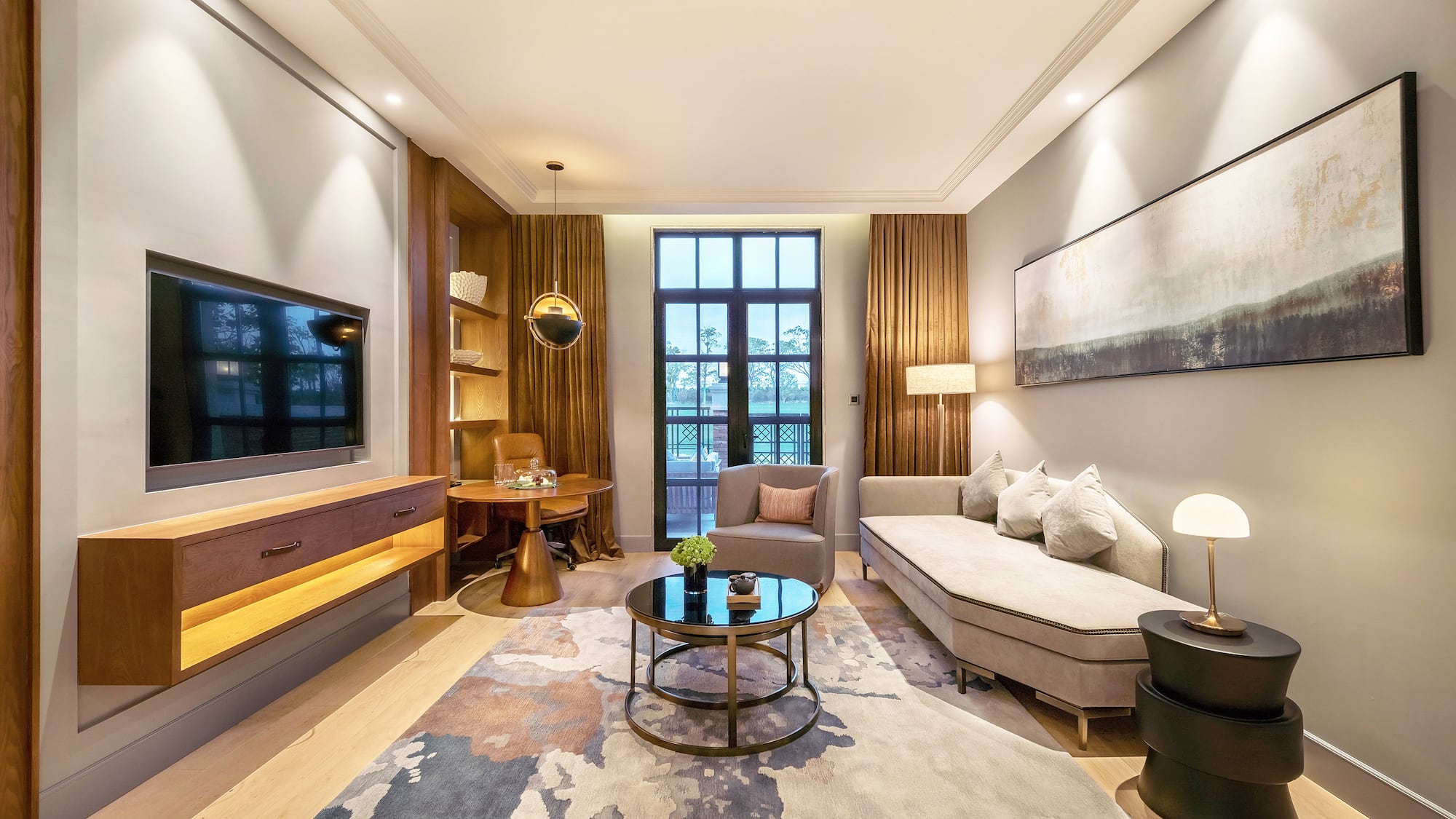 a living room with a couch and a tv