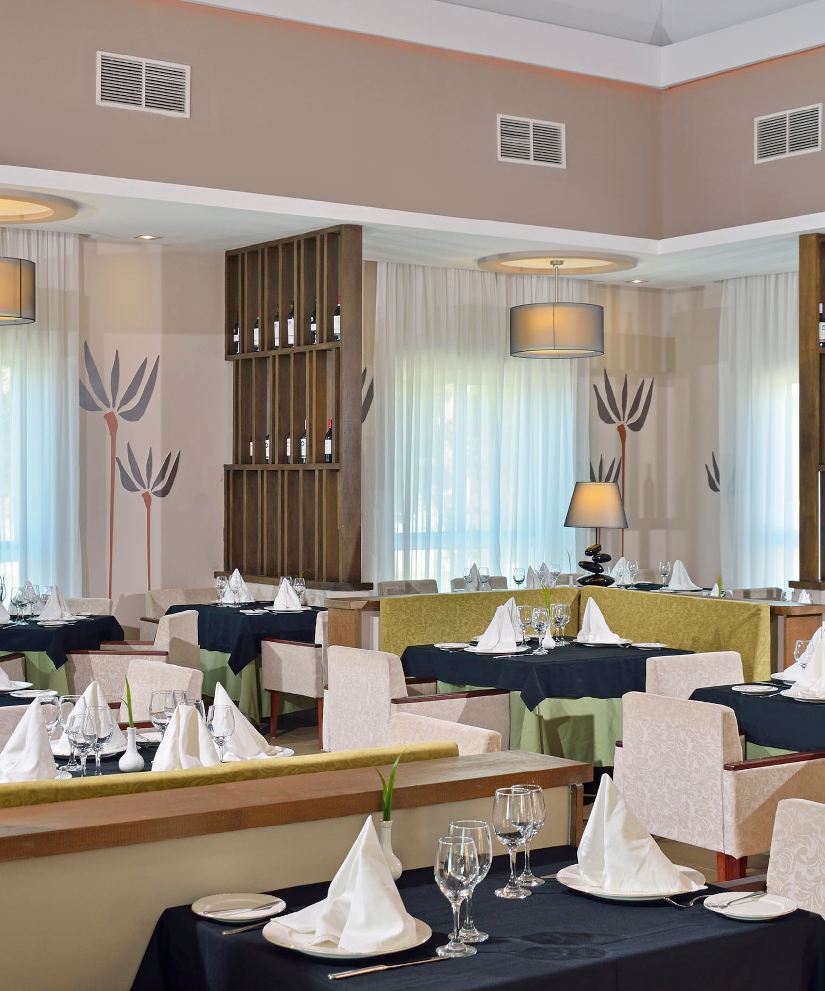 a restaurant with tables and chairs