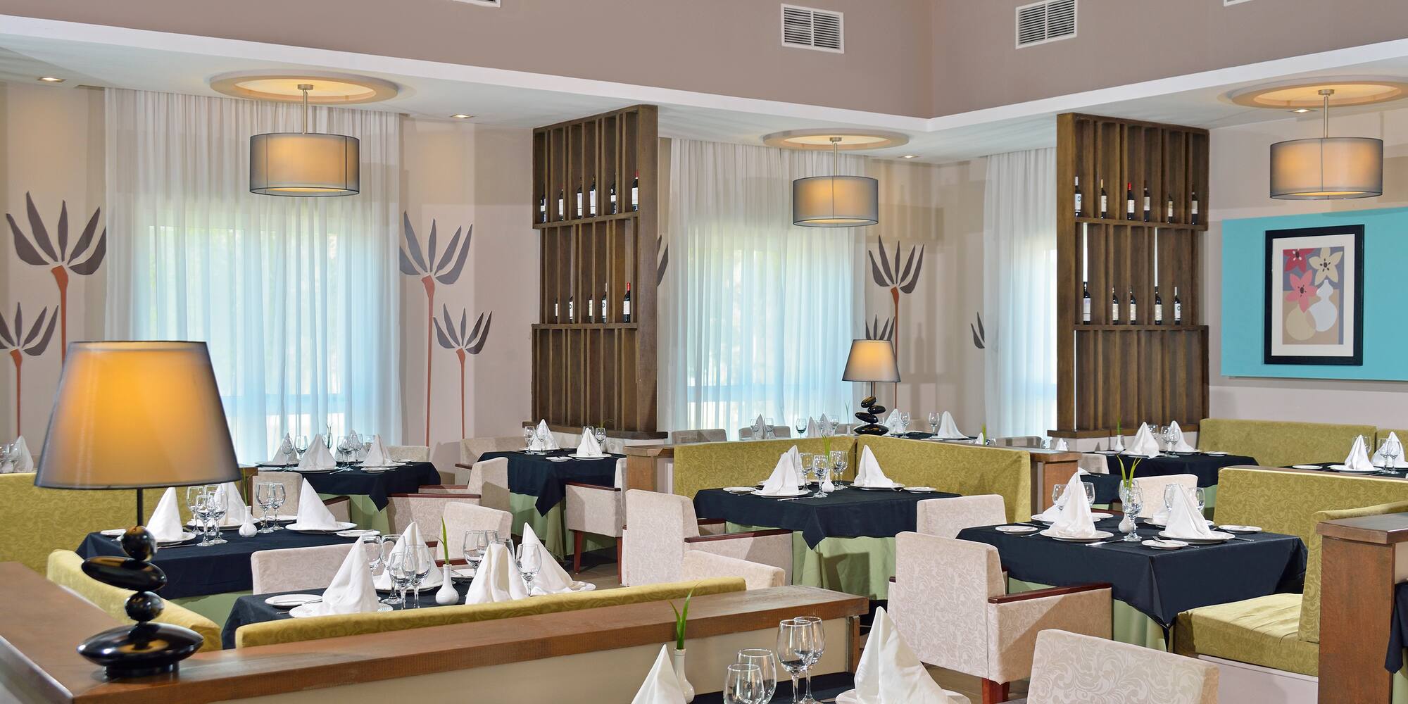 a restaurant with tables and chairs