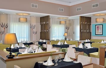 a restaurant with tables and chairs