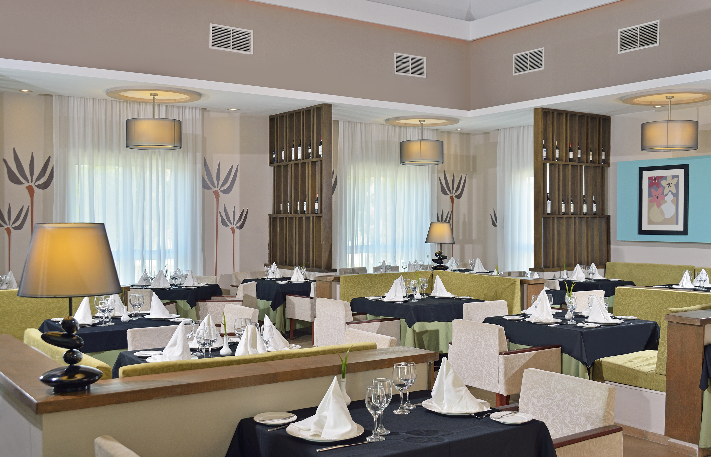 a restaurant with tables and chairs