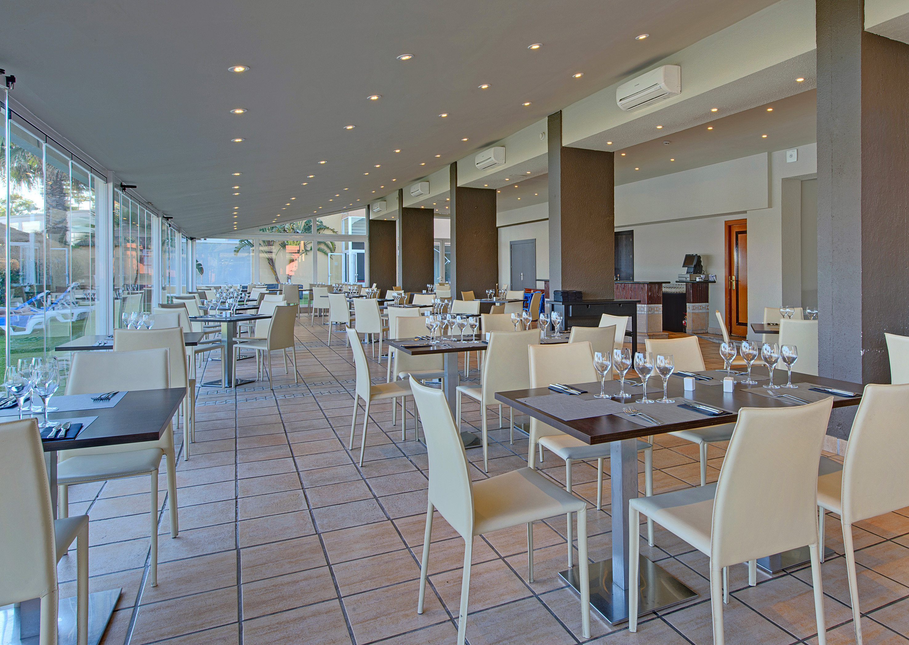 a restaurant with tables and chairs