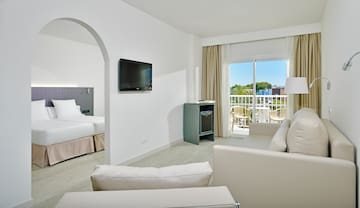 a room with a television and a television on the wall