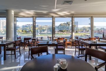 a room with tables and chairs