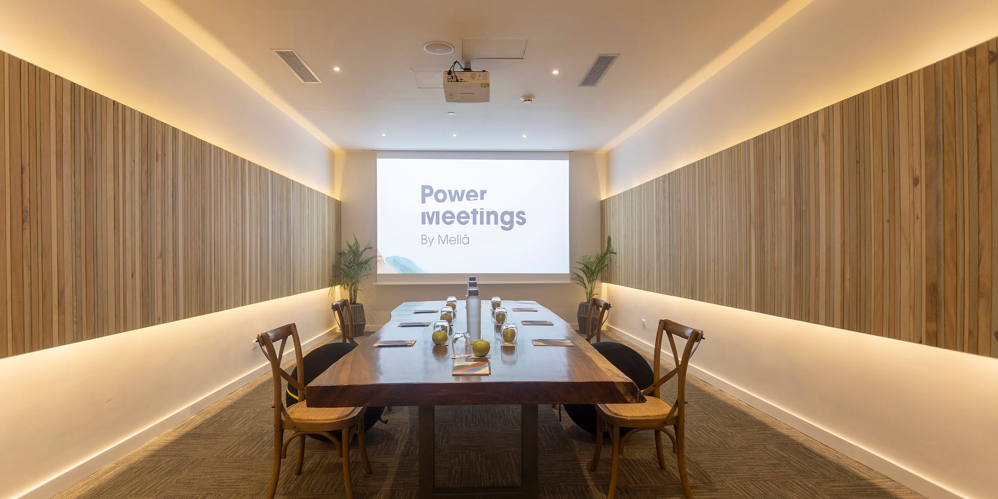 a room with a table and chairs