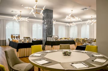 a room with tables and chairs