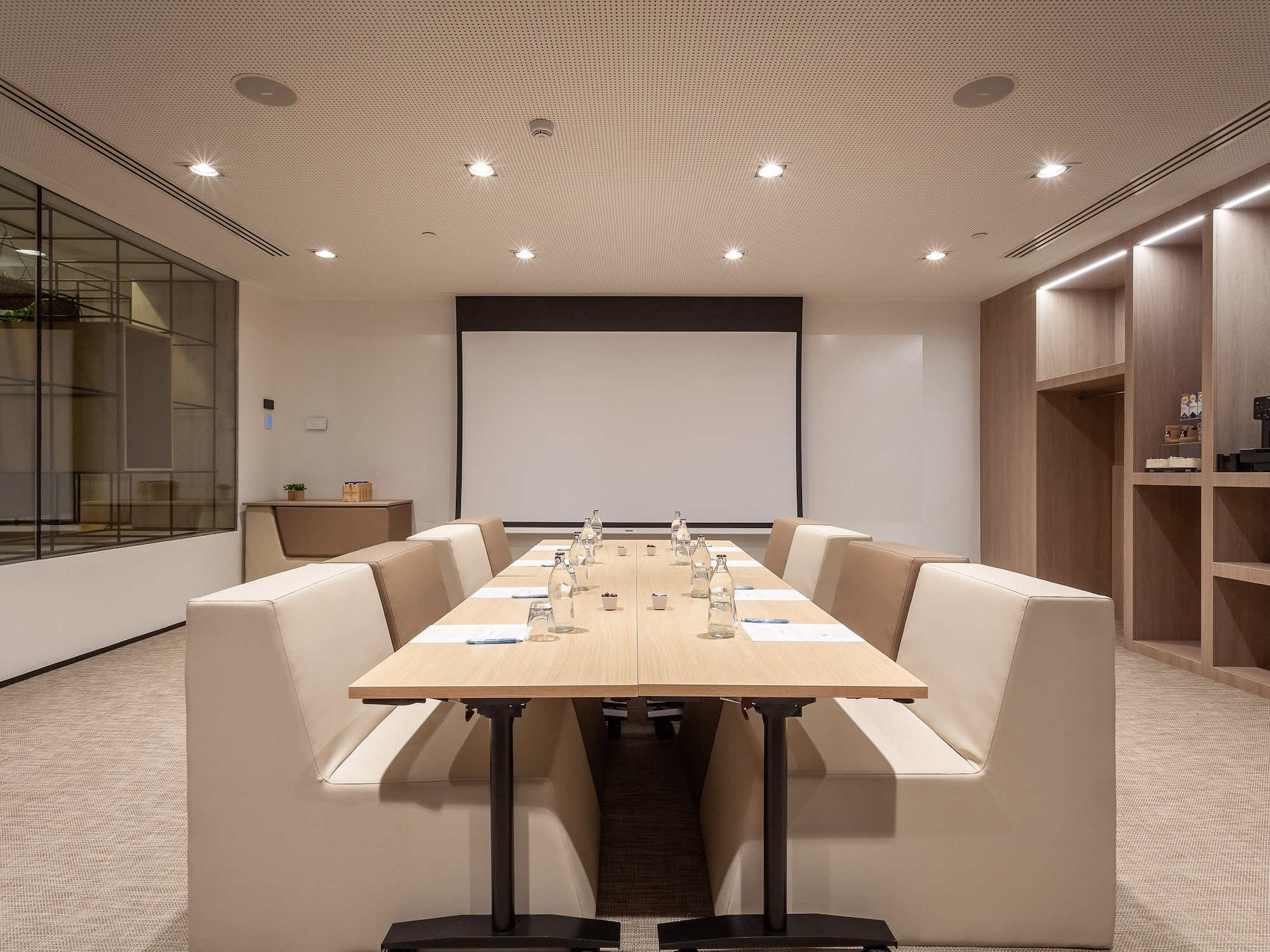 a room with a table and chairs