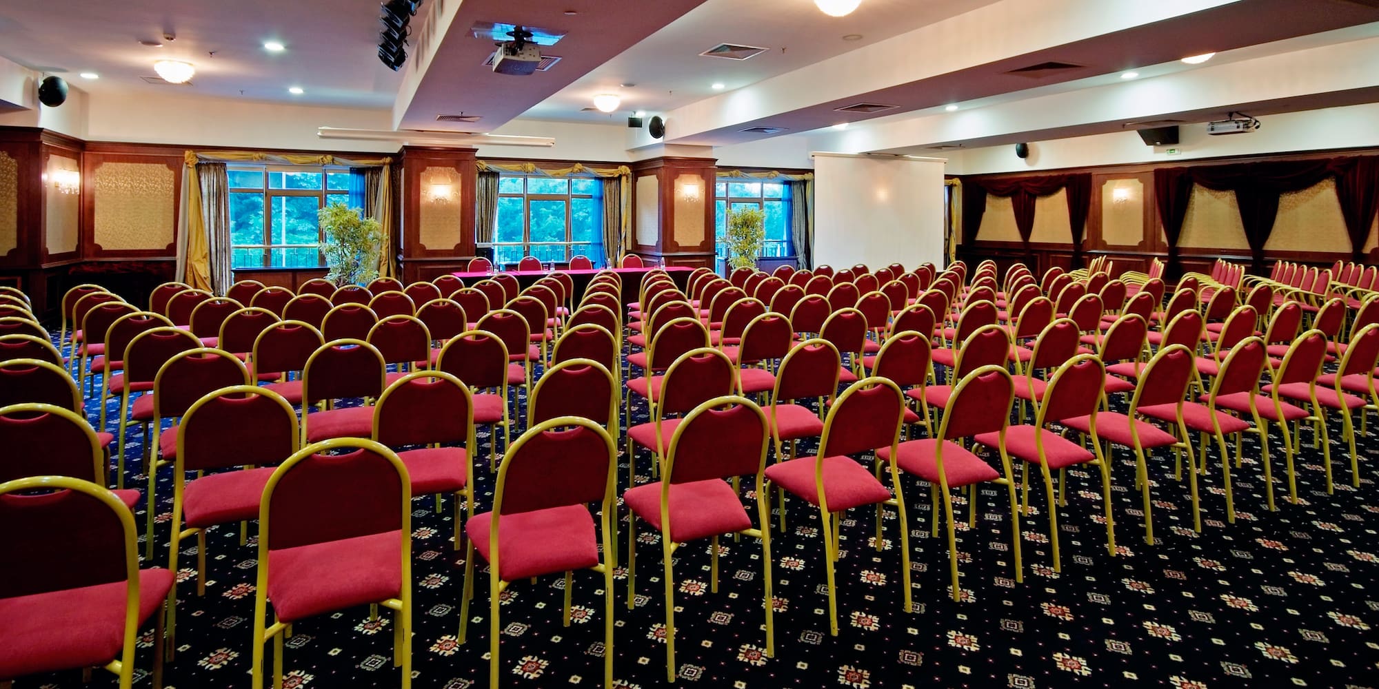 a room with rows of chairs