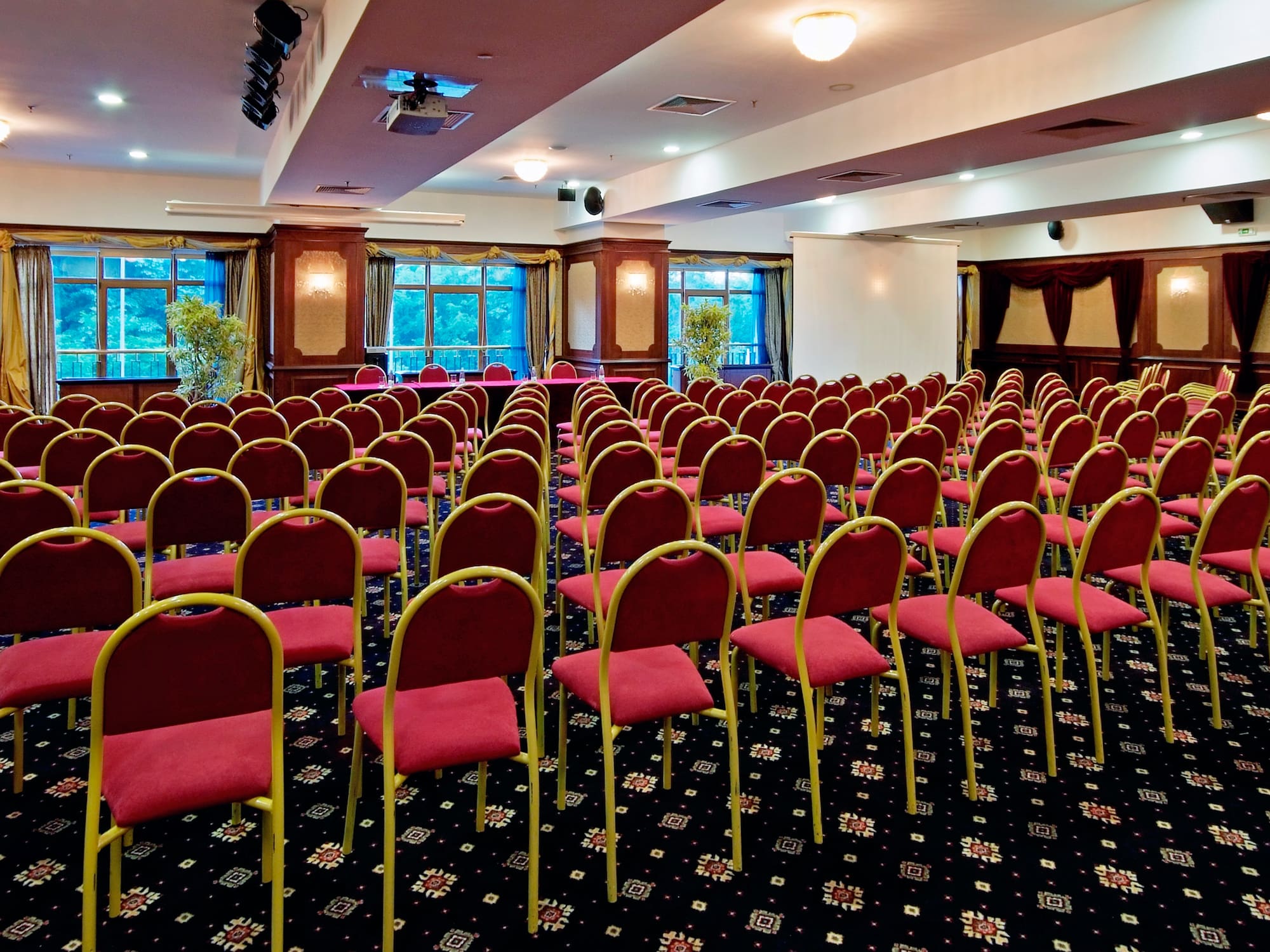 a room with rows of chairs