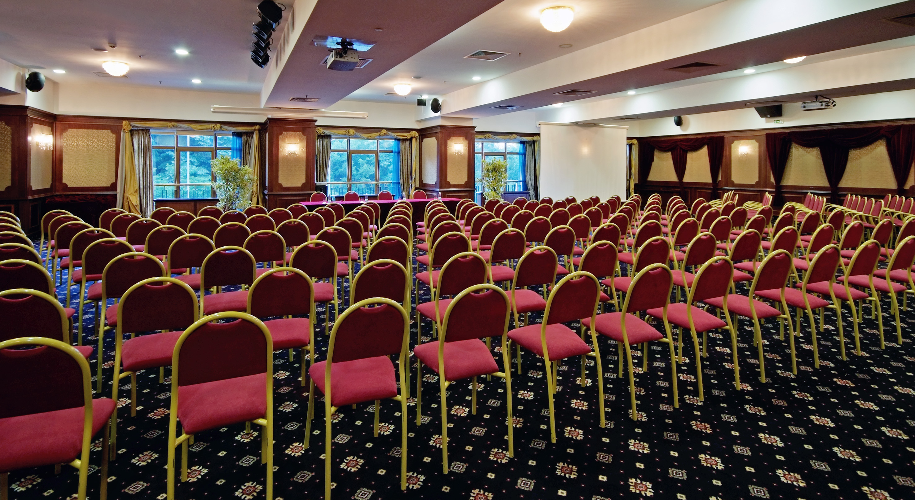 a room with rows of chairs
