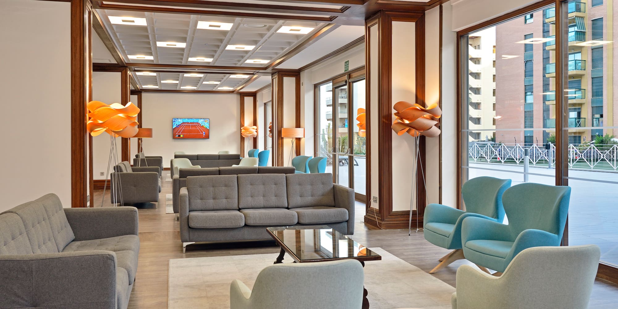 a room with couches and chairs