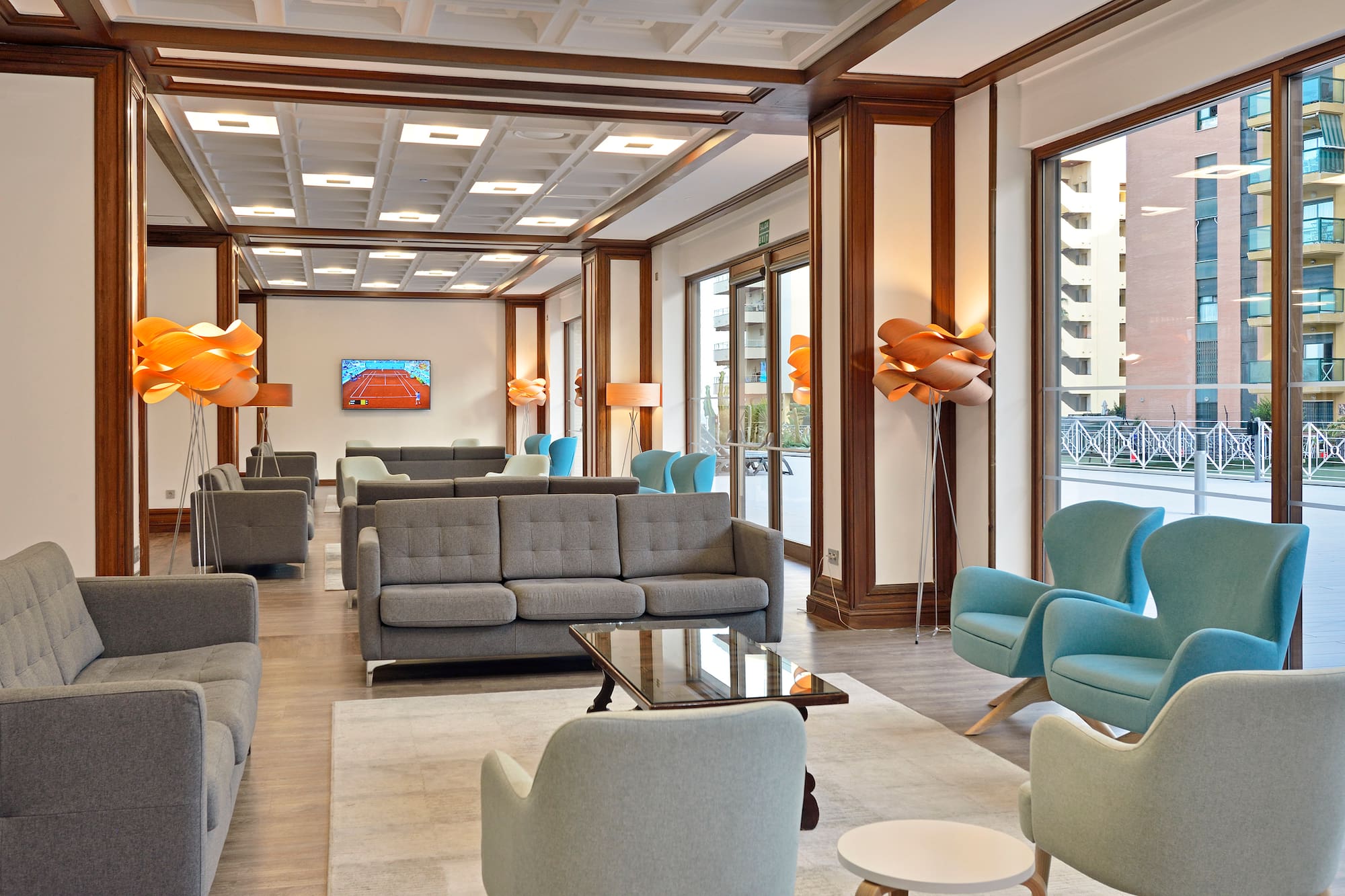 a room with couches and chairs