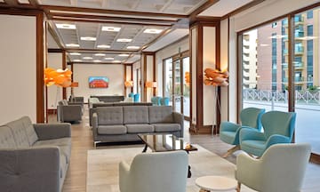 a room with couches and chairs